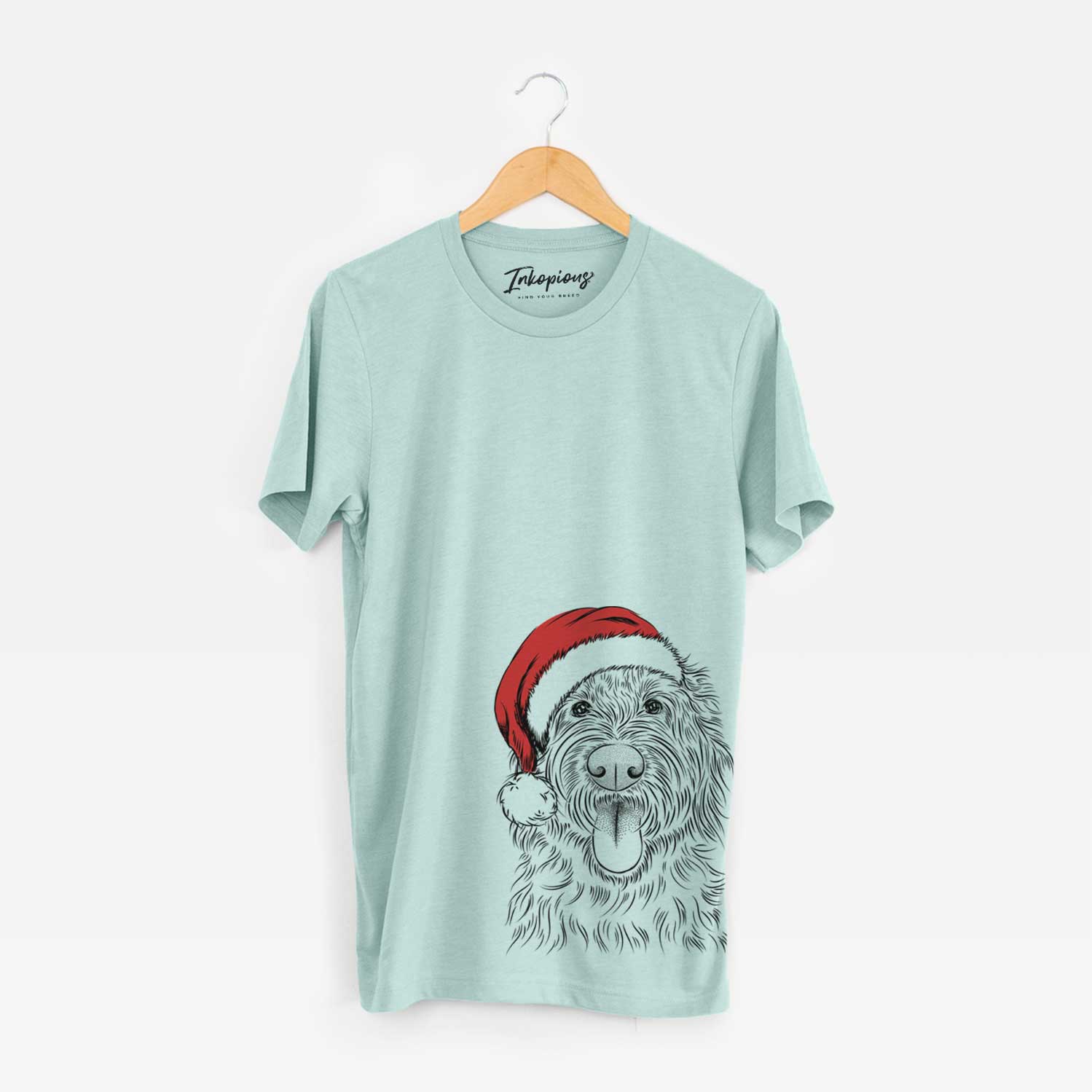 Hand-drawn sketch of Bennett the Doodle wearing a Santa hat on a Heather Sage Unisex crewneck