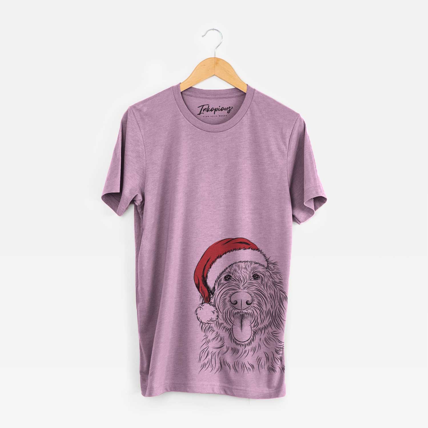 Hand-drawn sketch of Bennett the Doodle wearing a Santa hat on an Orchid Unisex crewneck