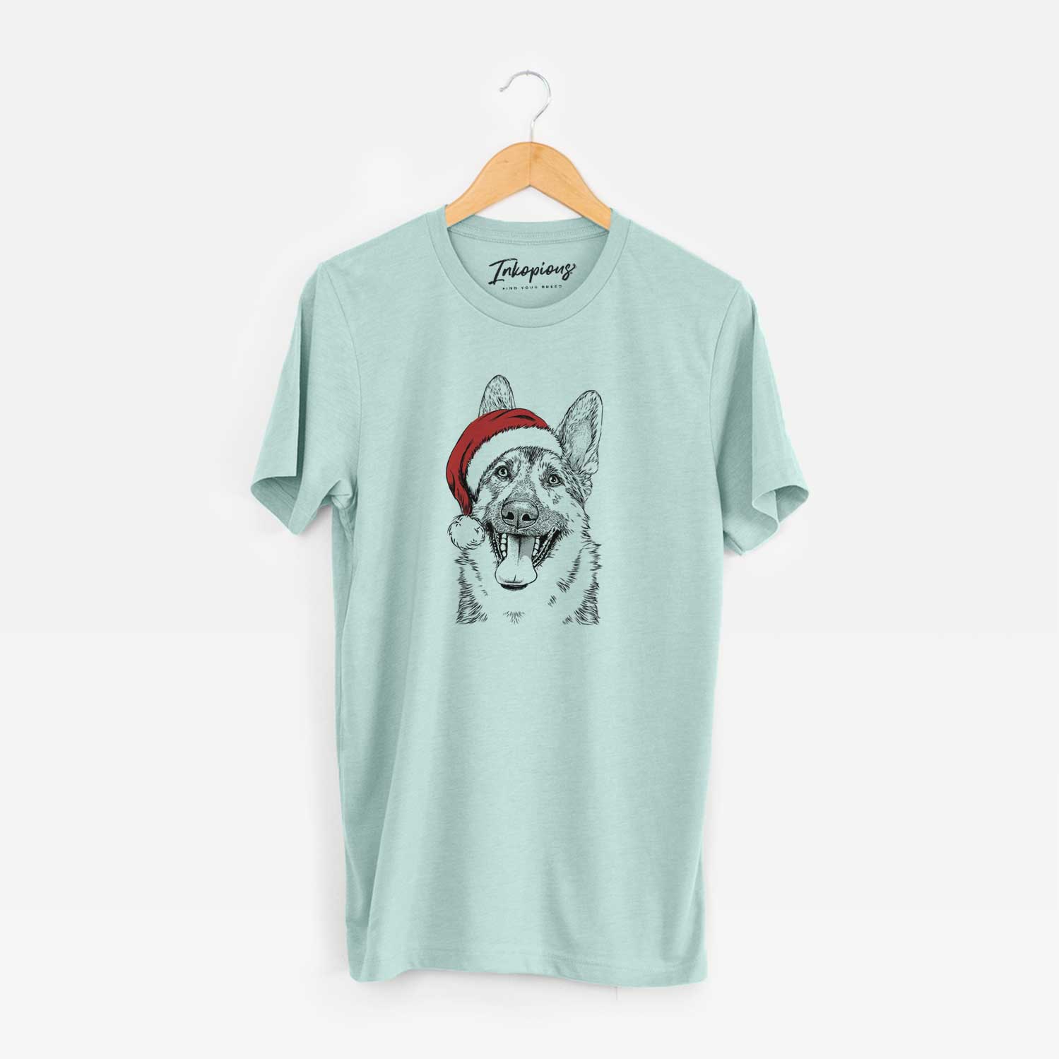 Hand-drawn sketch of Benson the German Shepherd wearing a Santa hat on a Heather Sage Unisex crewneck