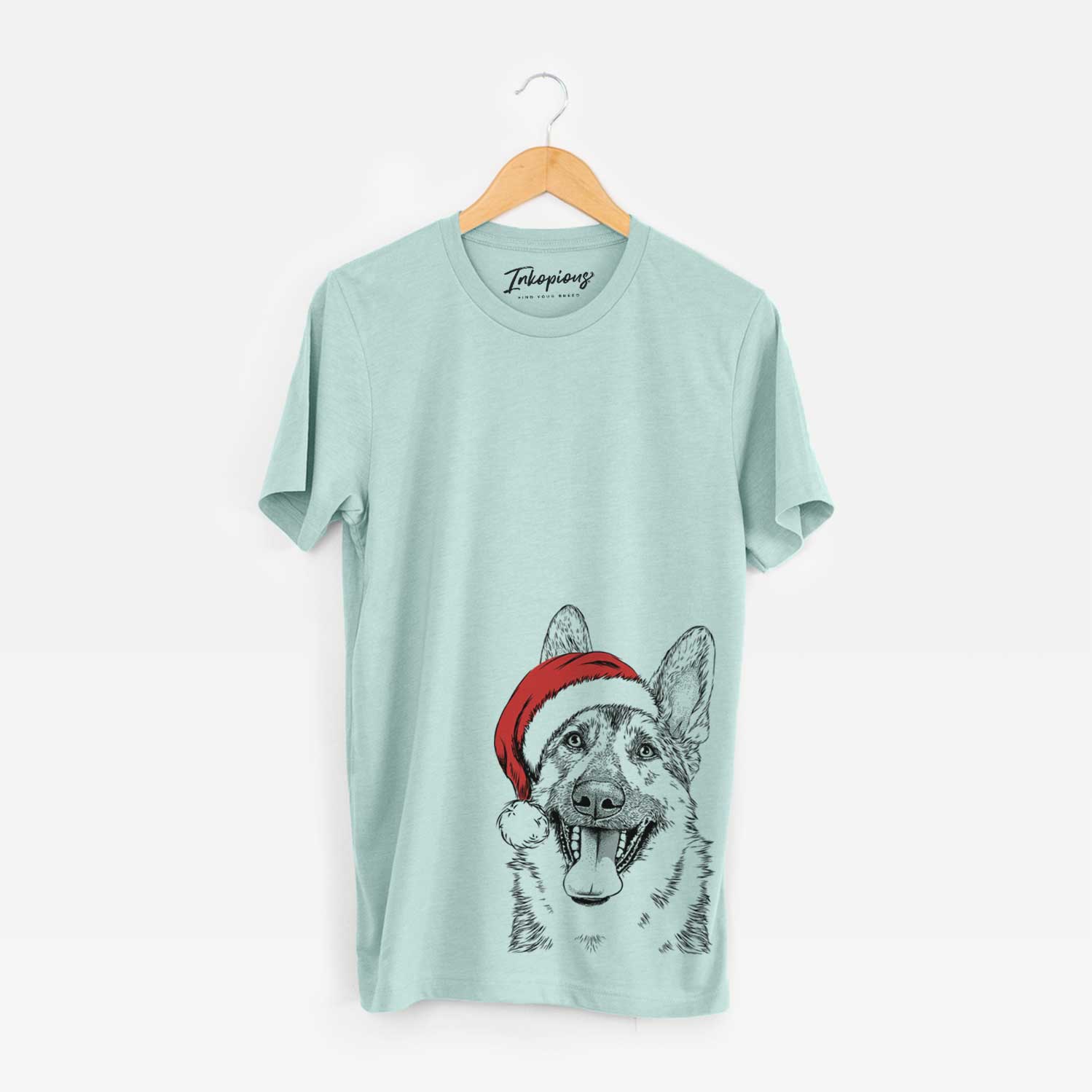 Hand-drawn sketch of Benson the German Shepherd wearing a Santa hat on a Heather Sage Unisex crewneck