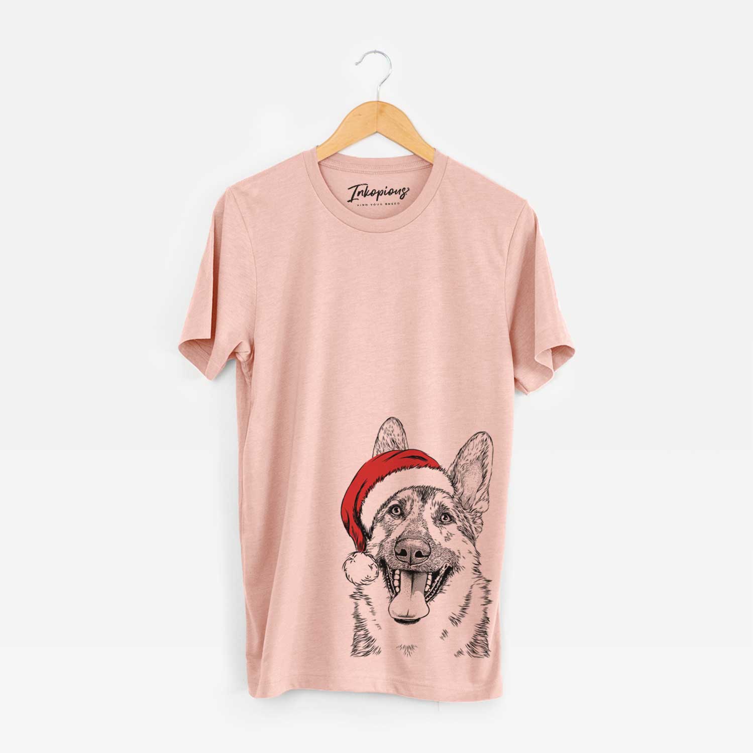 Hand-drawn sketch of Benson the German Shepherd wearing a Santa hat on a Peach Unisex crewneck