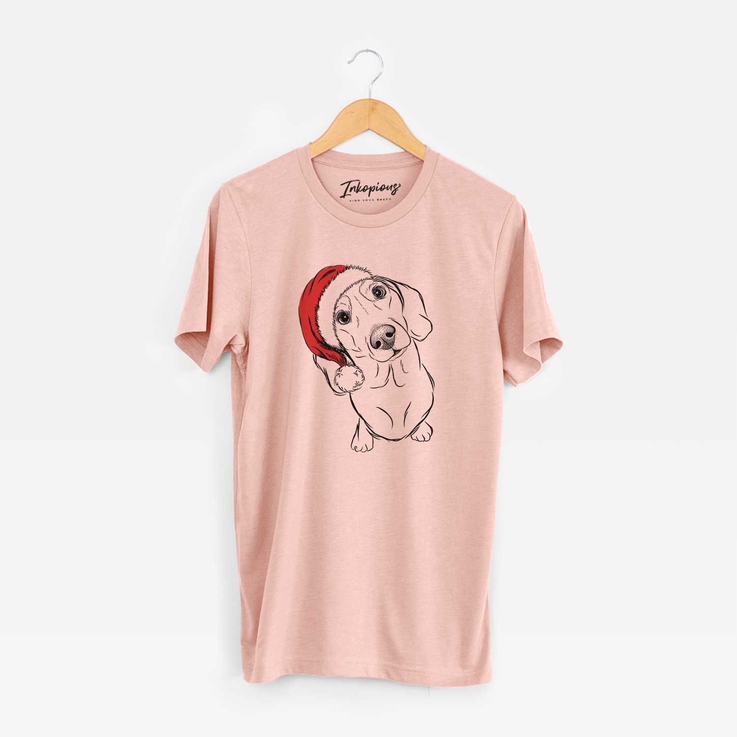 Hand-drawn sketch of Bill the Dachshund wearing a Santa hat on a Peach Unisex crewneck