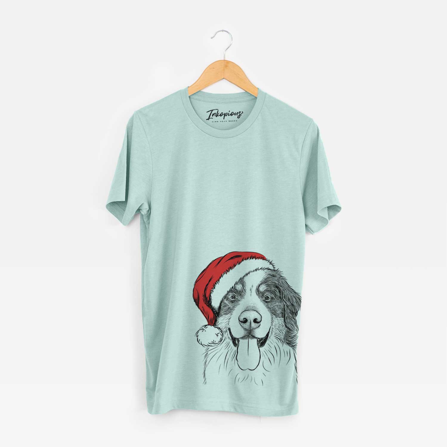 Hand-drawn sketch of Blaze the Bernese Mountain Dog wearing a Santa hat on a Heather Sage Unisex crewneck