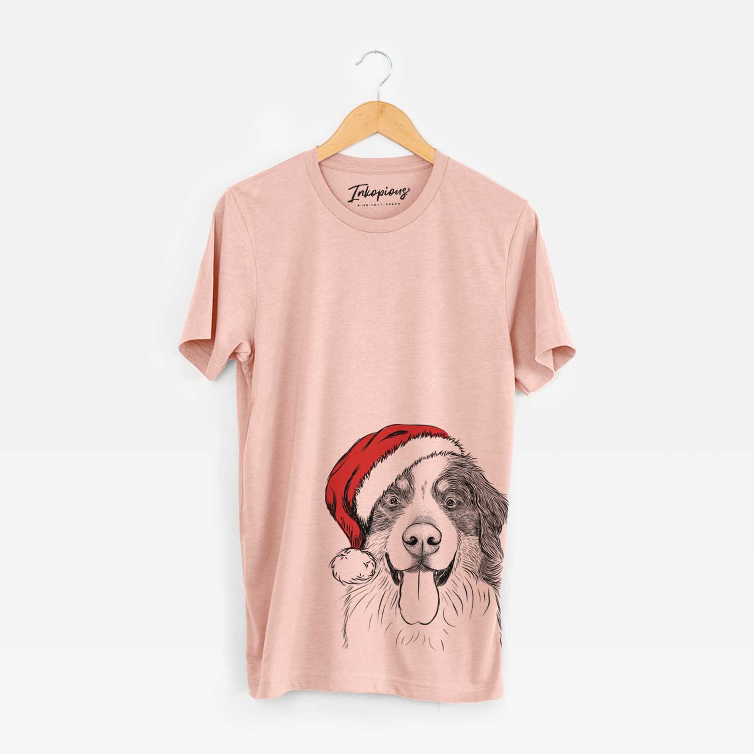 Hand-drawn sketch of Blaze the Bernese Mountain Dog wearing a Santa hat on a Peach Unisex crewneck