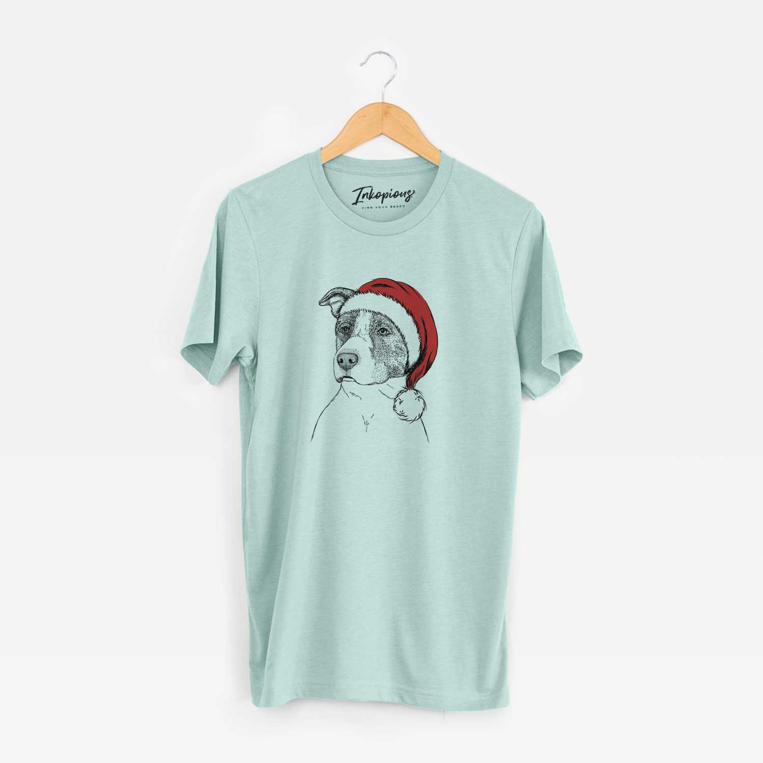 Hand-drawn sketch of Blu the Pitbull wearing a Santa hat on a Heather Sage Unisex crewneck