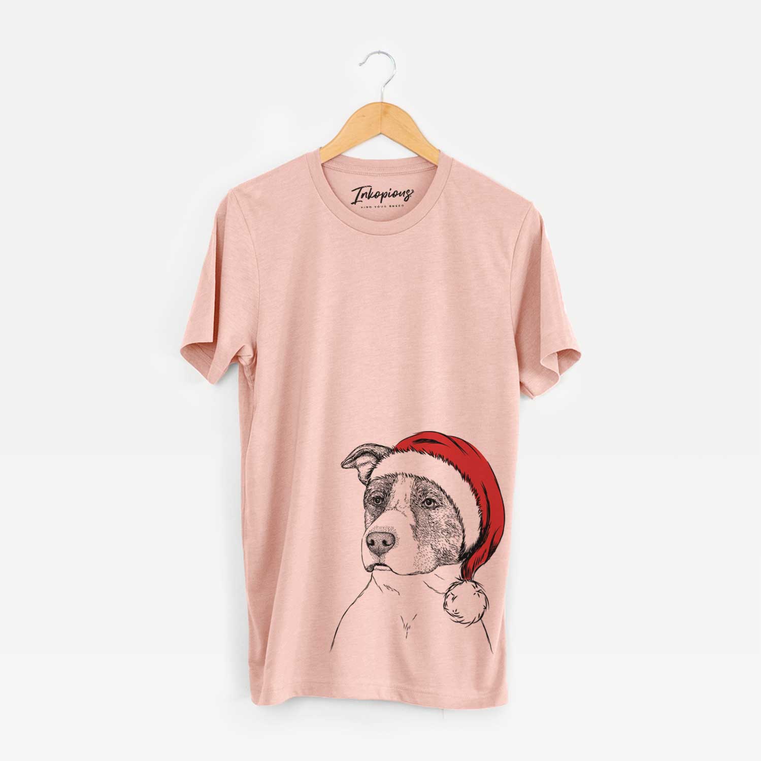Hand-drawn sketch of Blu the Pitbull wearing a Santa hat on a Peach Unisex crewneck