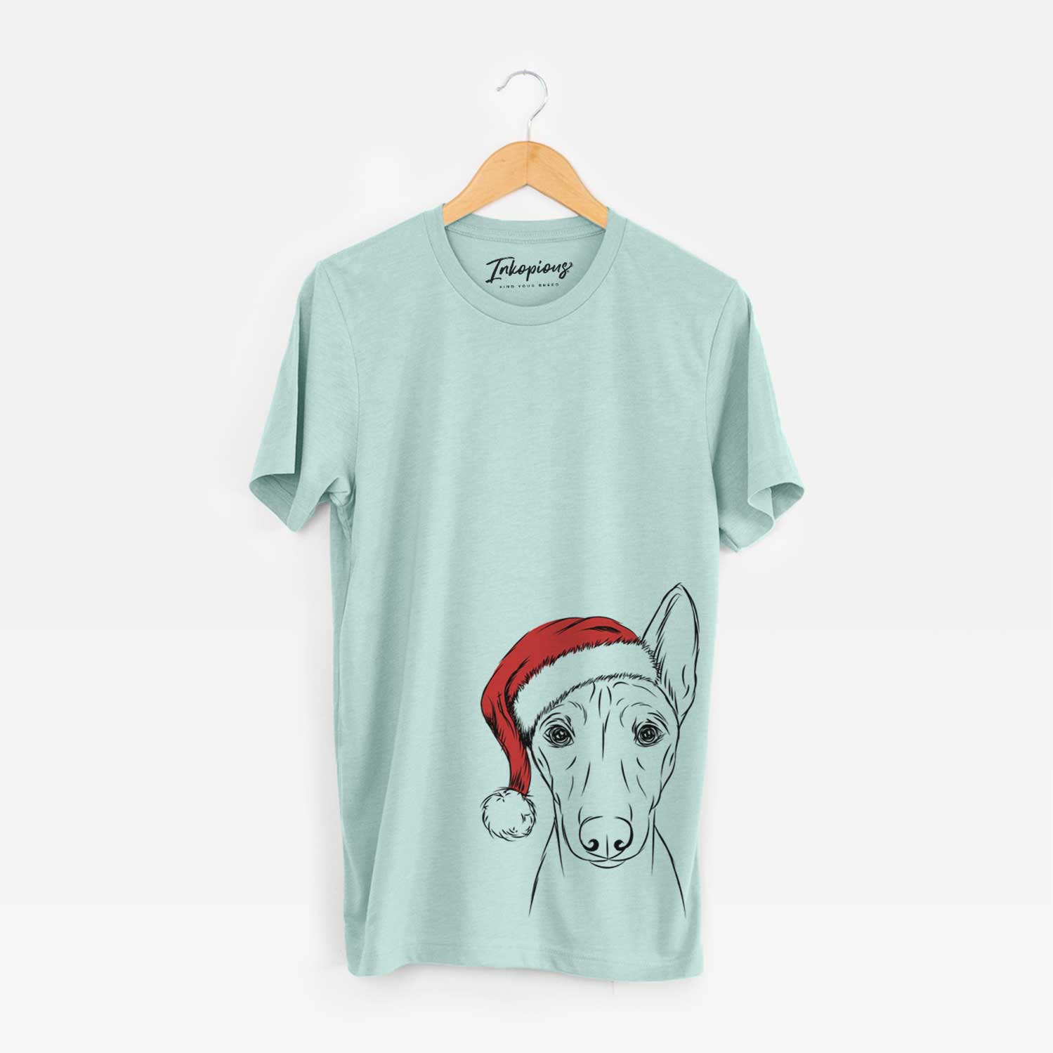 Hand-drawn sketch of Bonsai the Basenji wearing a Santa hat on a Heather Sage Unisex crewneck