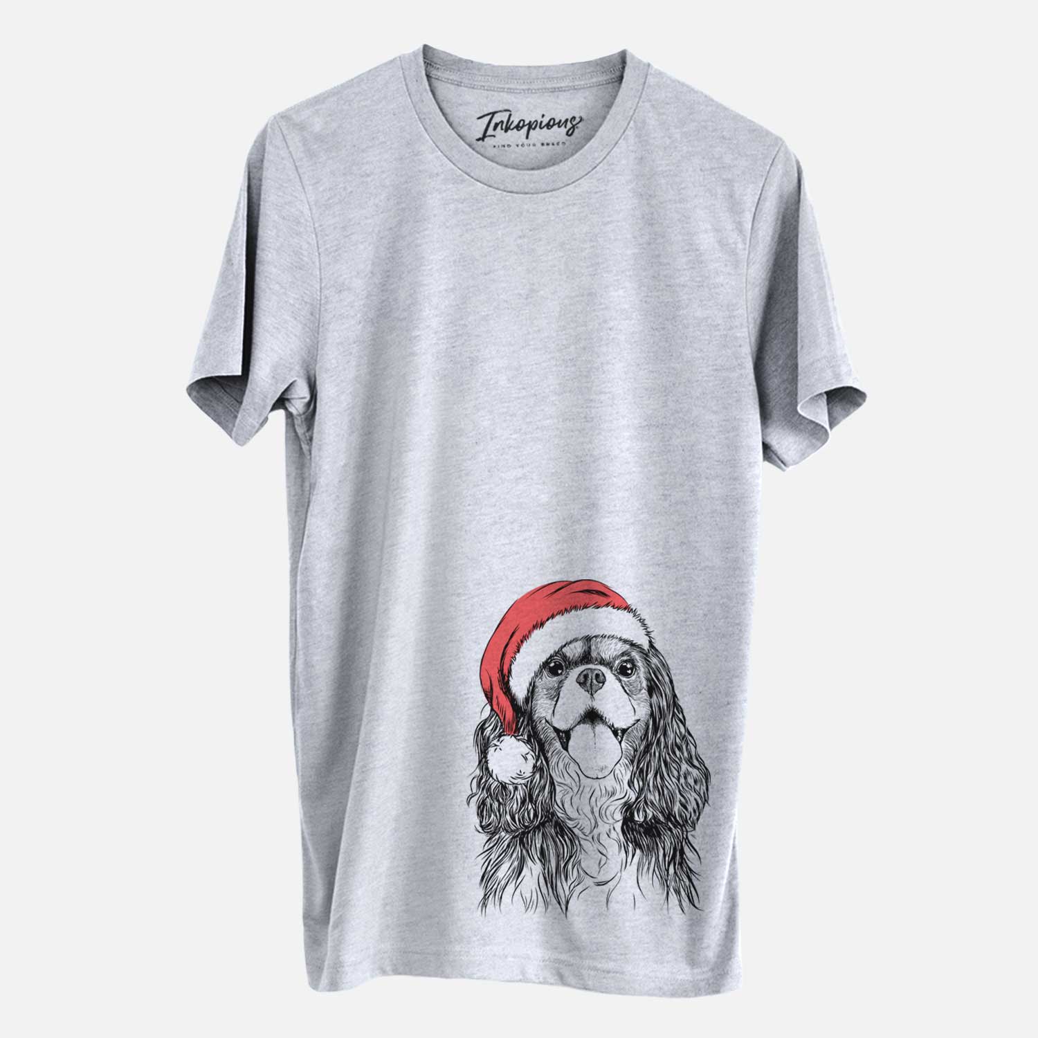 Hand-drawn sketch of Brandy the Cavalier King Charles Spaniel wearing a Santa hat on a Grey Unisex crewneck
