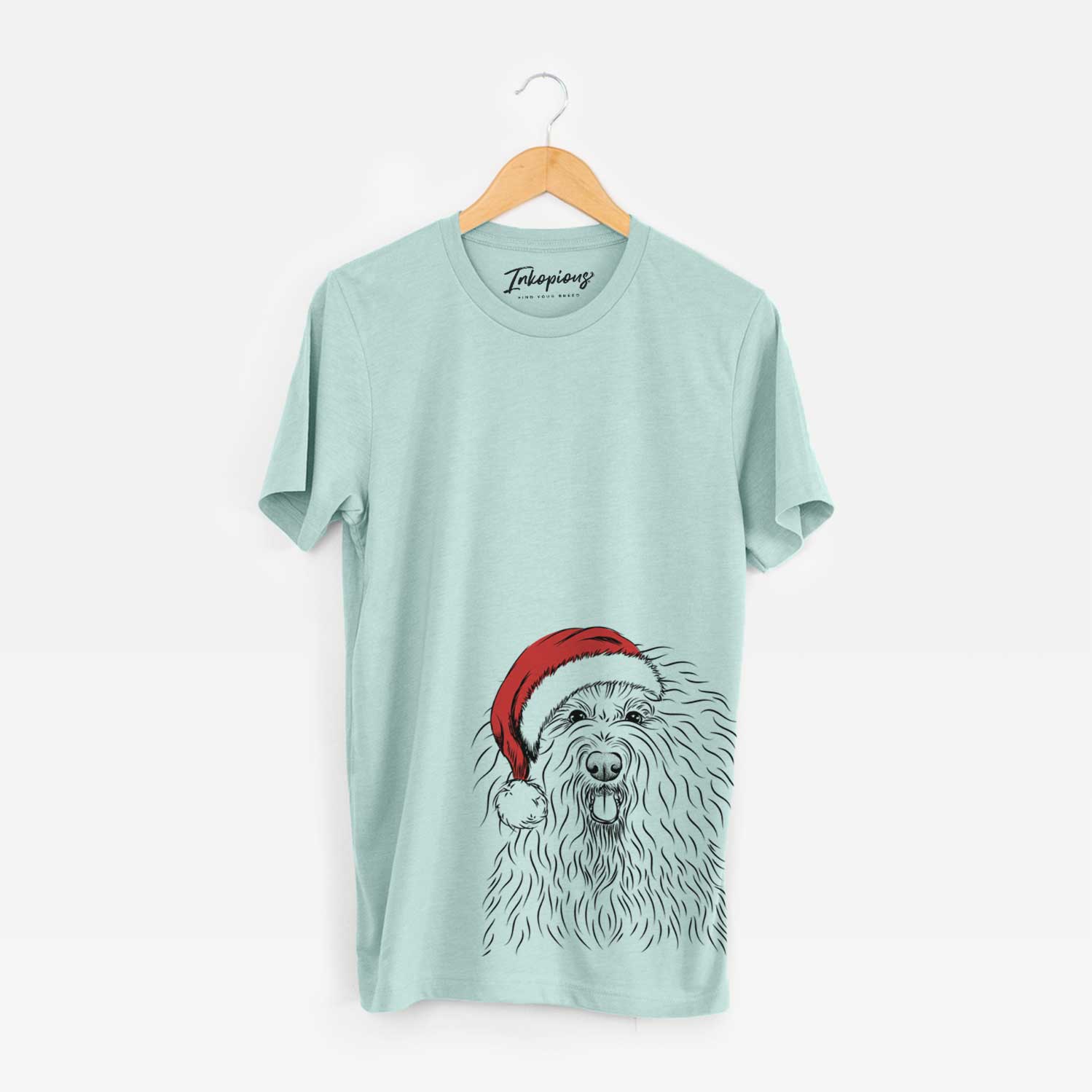 Hand-drawn sketch of Brody the Old English Sheepdog wearing a Santa hat on a Heather Sage Unisex crewneck