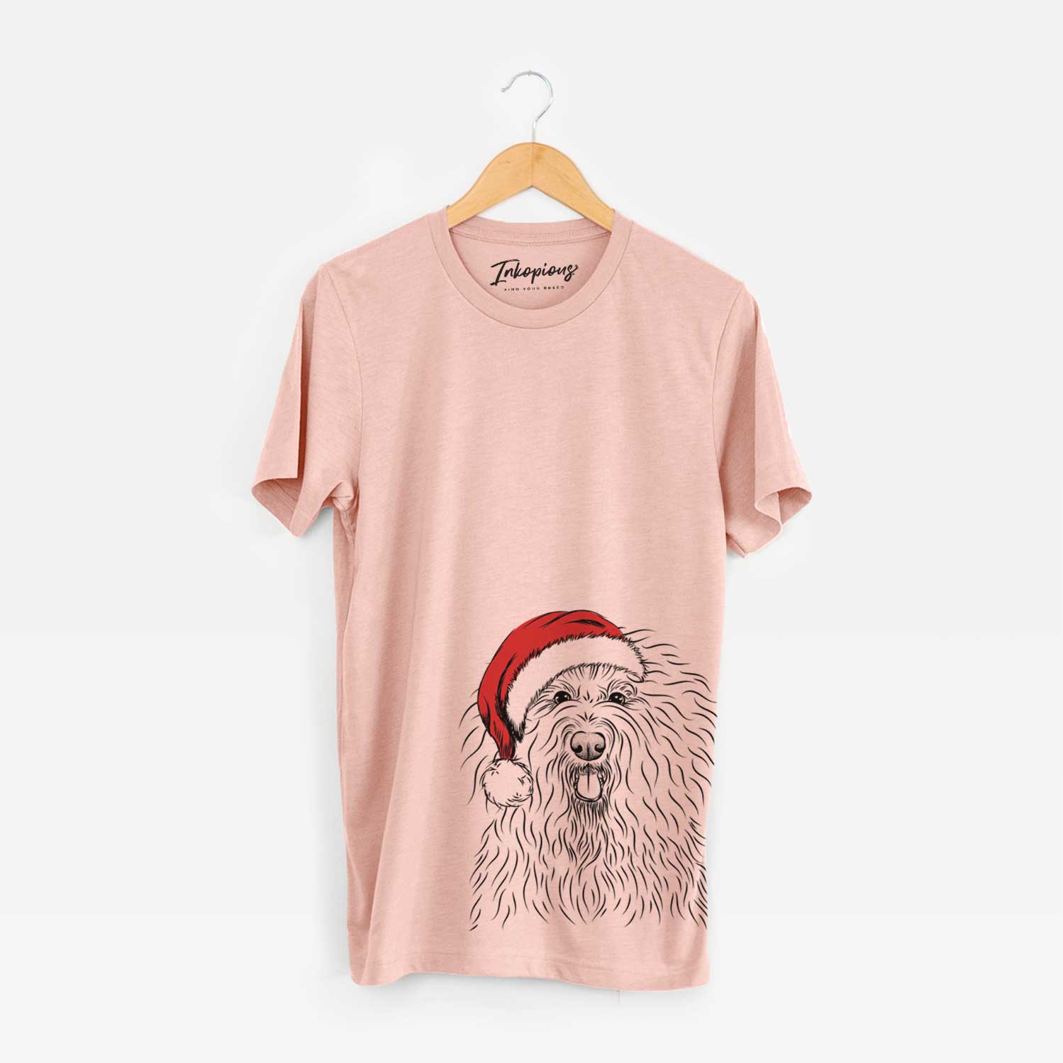 Hand-drawn sketch of Brody the Old English Sheepdog wearing a Santa hat on a Peach Unisex crewneck