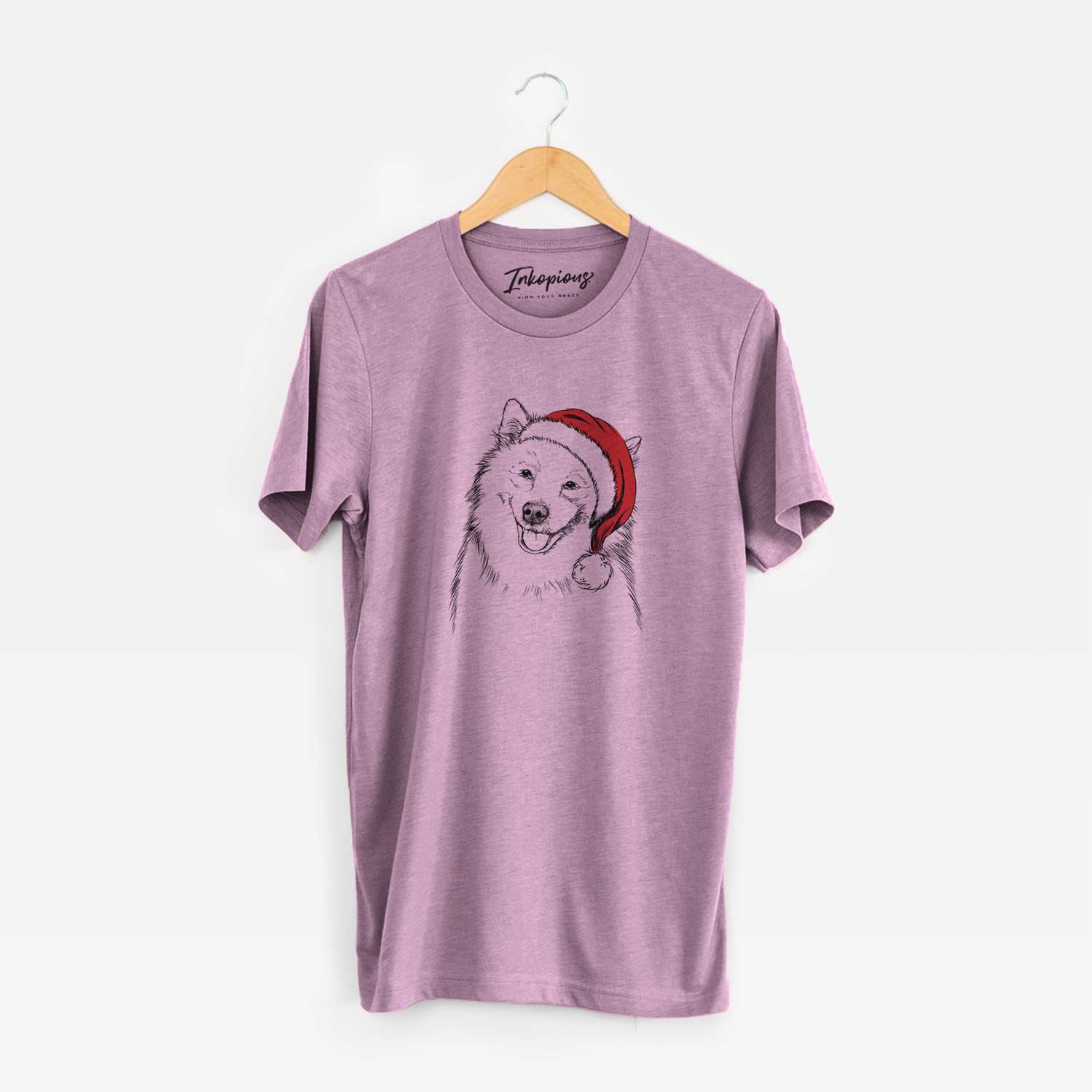 Hand-drawn sketch of Caico the Samoyed wearing a Santa hat on an Orchid Unisex crewneck