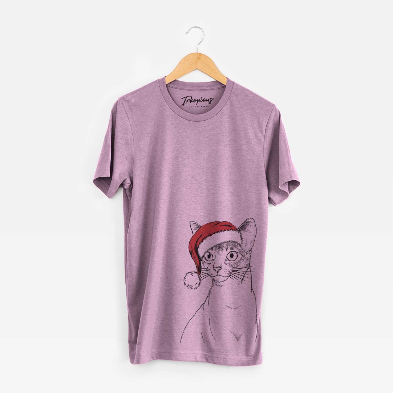 Hand-drawn sketch of Cedric the Abyssinian Cat wearing a Santa hat on an Orchid Unisex crewneck