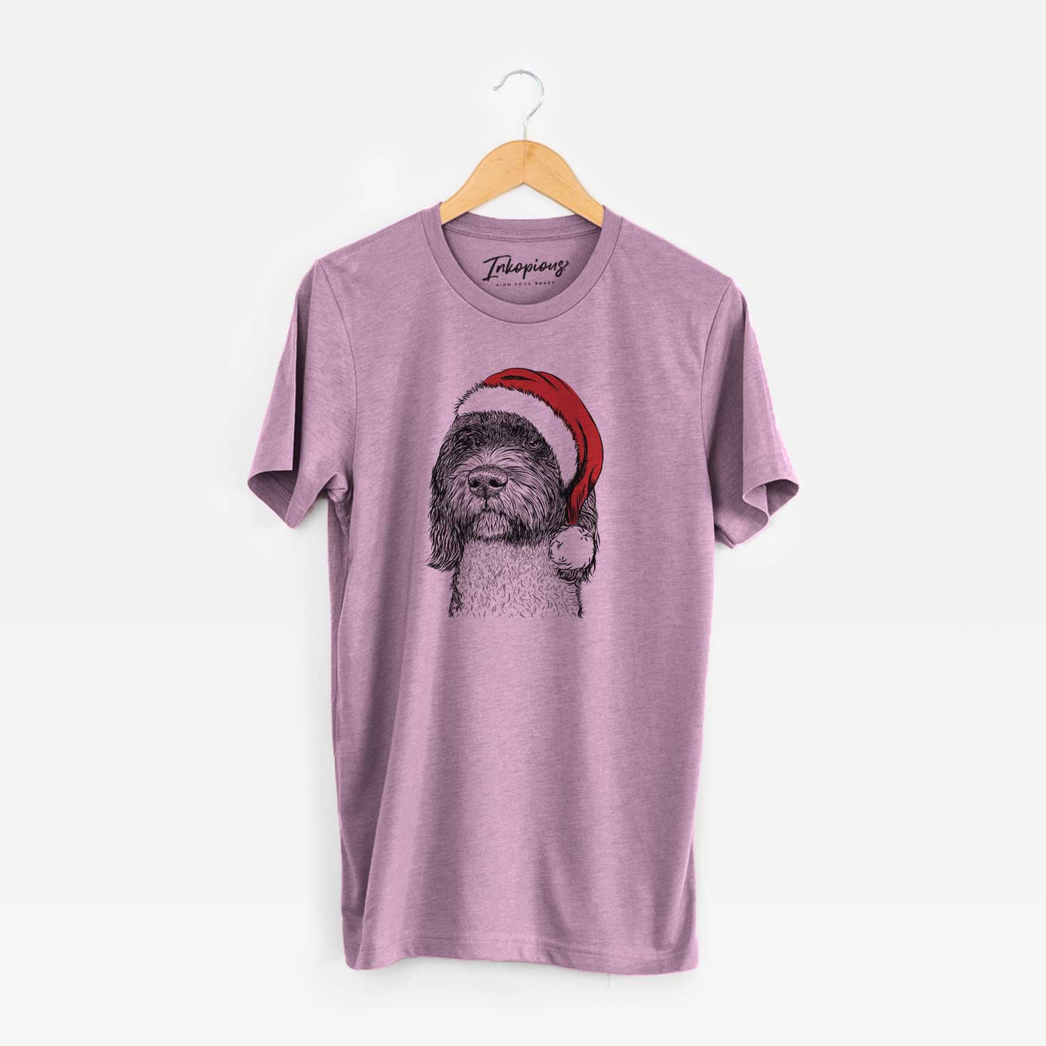 Hand-drawn sketch of Chris the Portuguese Water Dog wearing a Santa hat on an Orchid Unisex crewneck