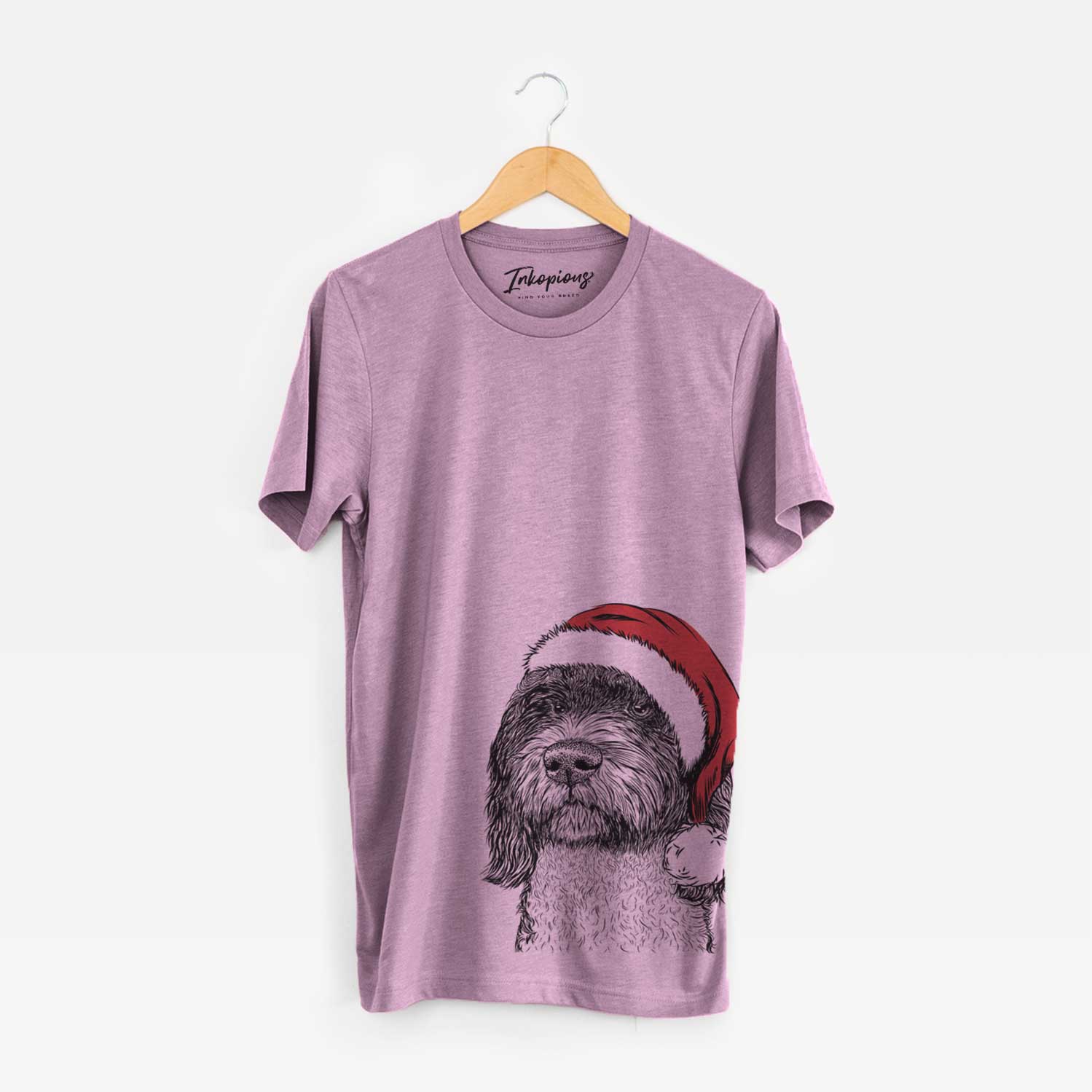 Hand-drawn sketch of Chris the Portuguese Water Dog wearing a Santa hat on an Orchid Unisex crewneck