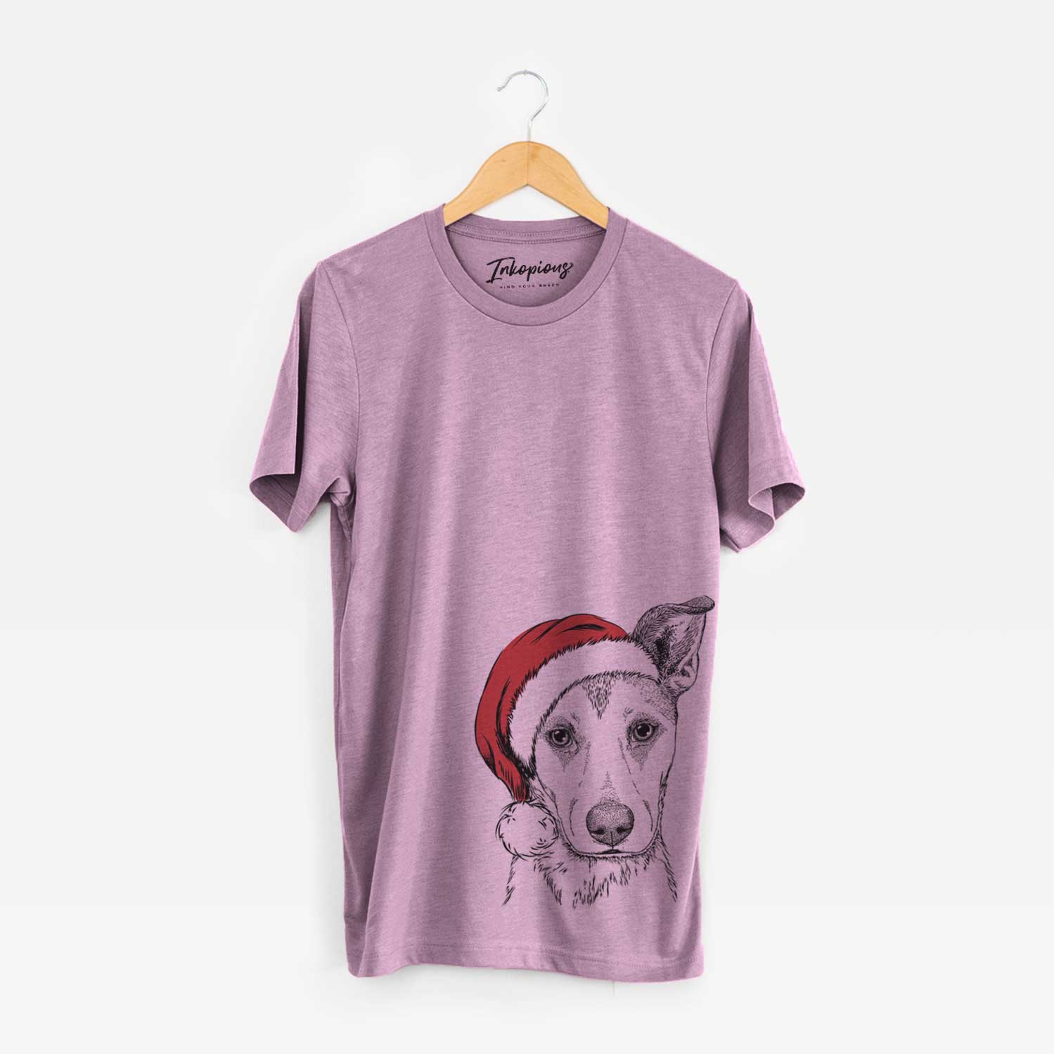 Hand-drawn sketch of Coral the Mixed Breed wearing a Santa hat on an Orchid Unisex crewneck