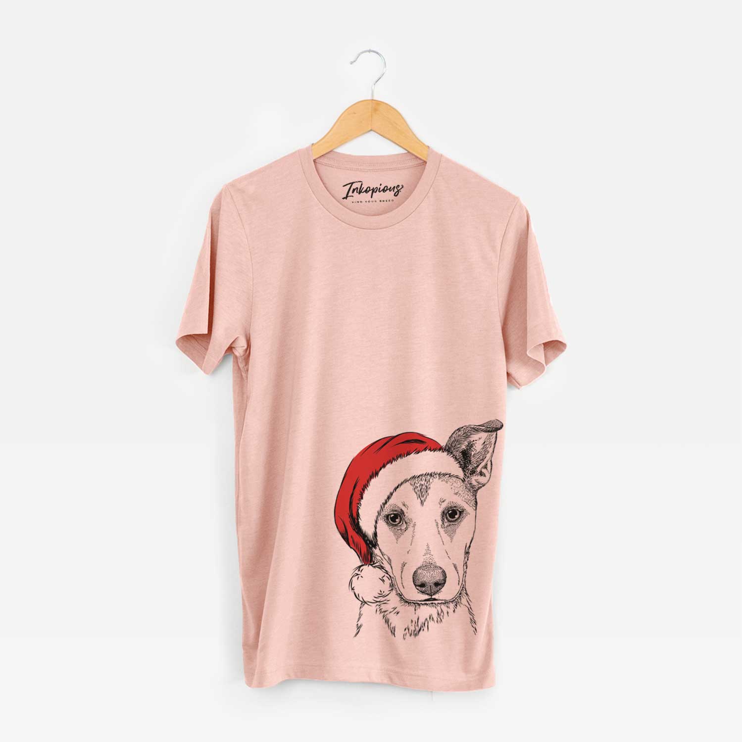 Hand-drawn sketch of Coral the Mixed Breed wearing a Santa hat on a Peach Unisex crewneck