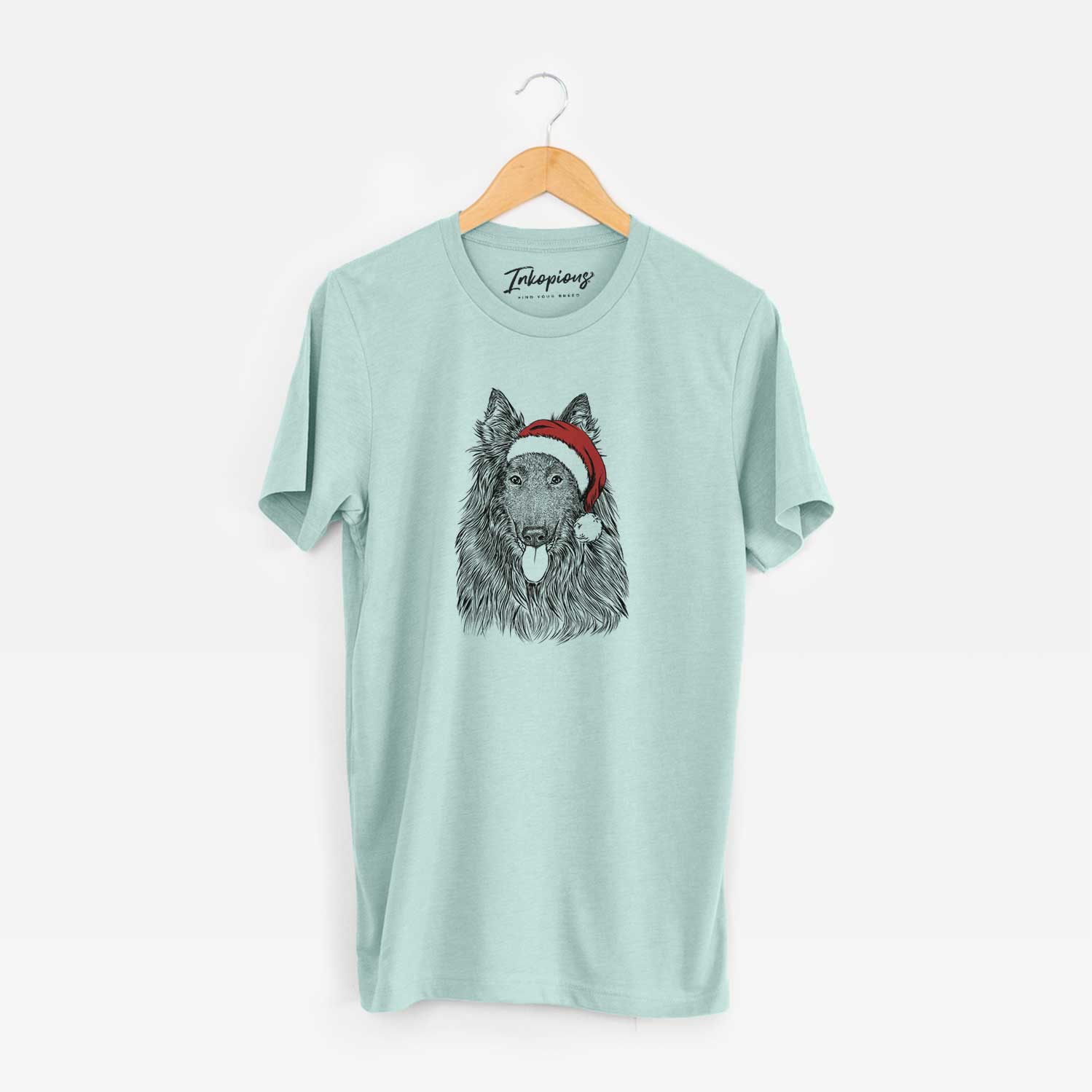Hand-drawn sketch of Daan the Belgian Shepherd wearing a Santa hat on a Heather Sage Unisex crewneck