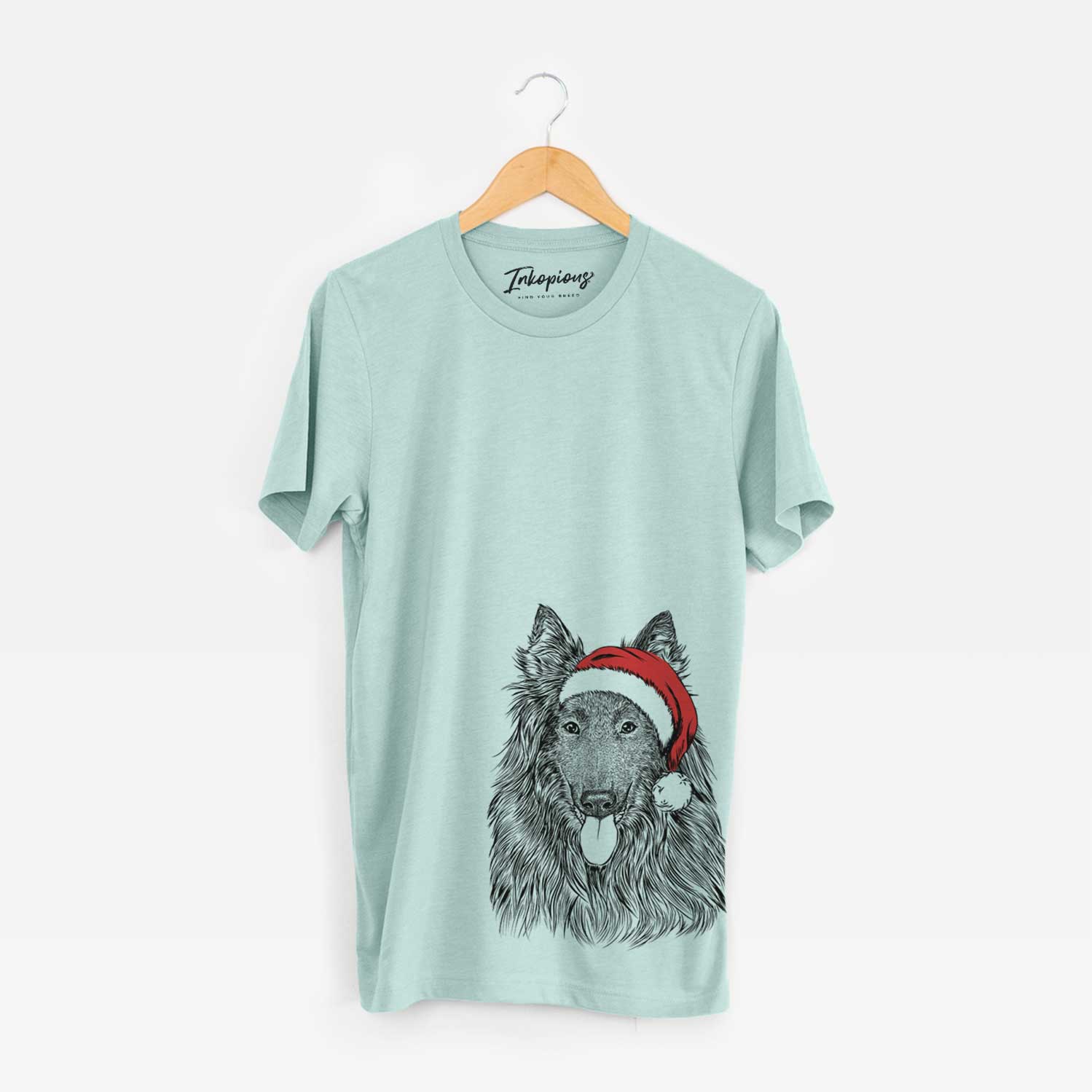 Hand-drawn sketch of Daan the Belgian Shepherd wearing a Santa hat on a Heather Sage Unisex crewneck