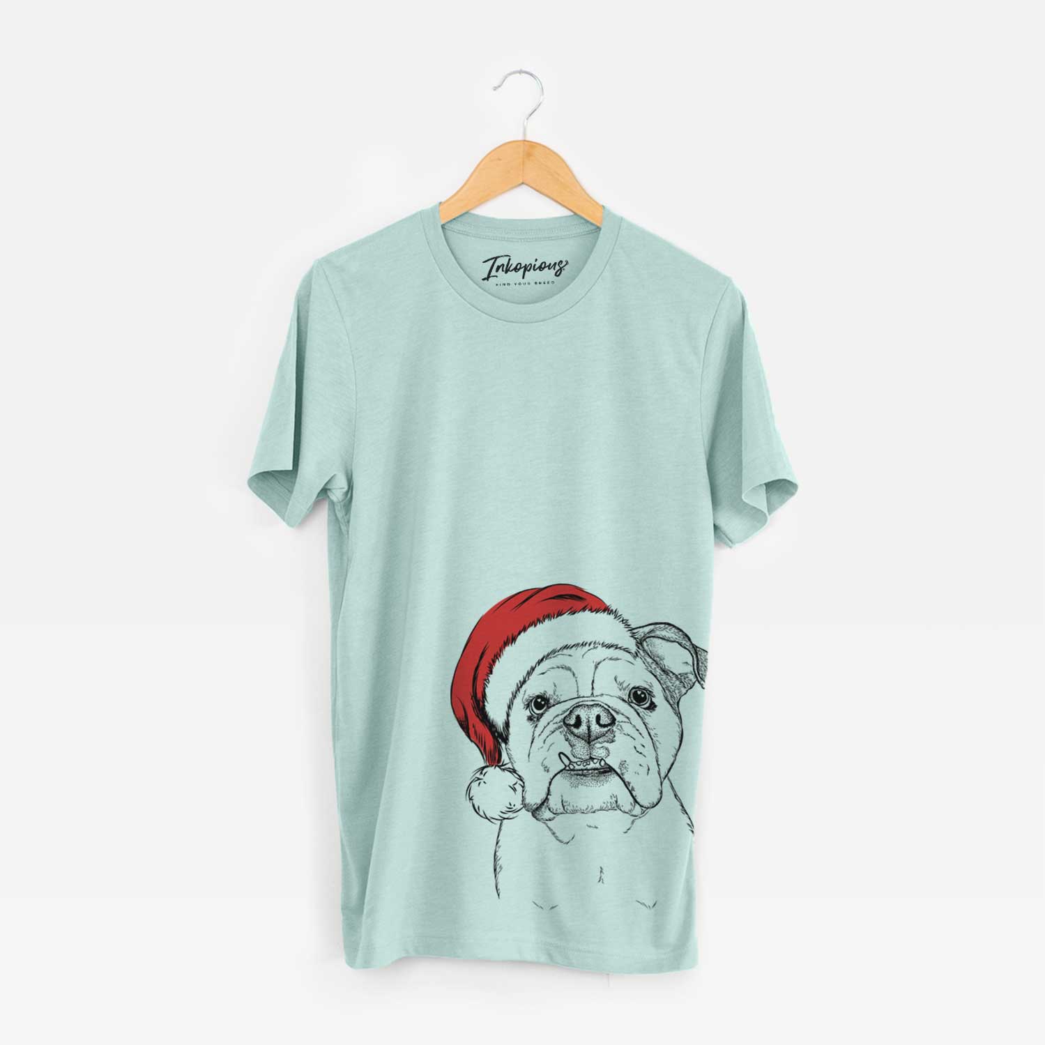 Hand-drawn sketch of Dazy the English Bulldog wearing a Santa hat on a Heather Sage Unisex crewneck