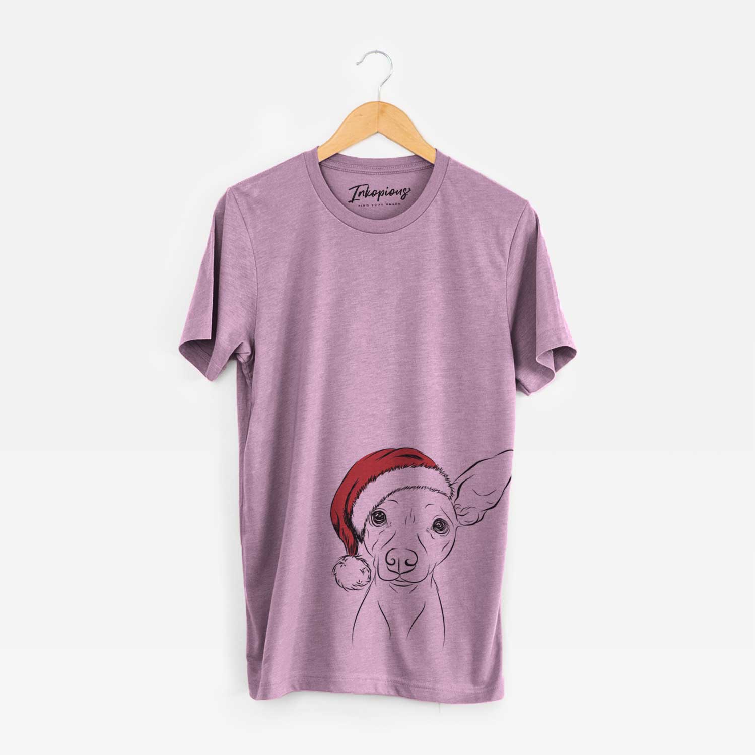 Hand-drawn sketch of Desi the American Hairless Terrier wearing a Santa hat on an Orchid Unisex crewneck