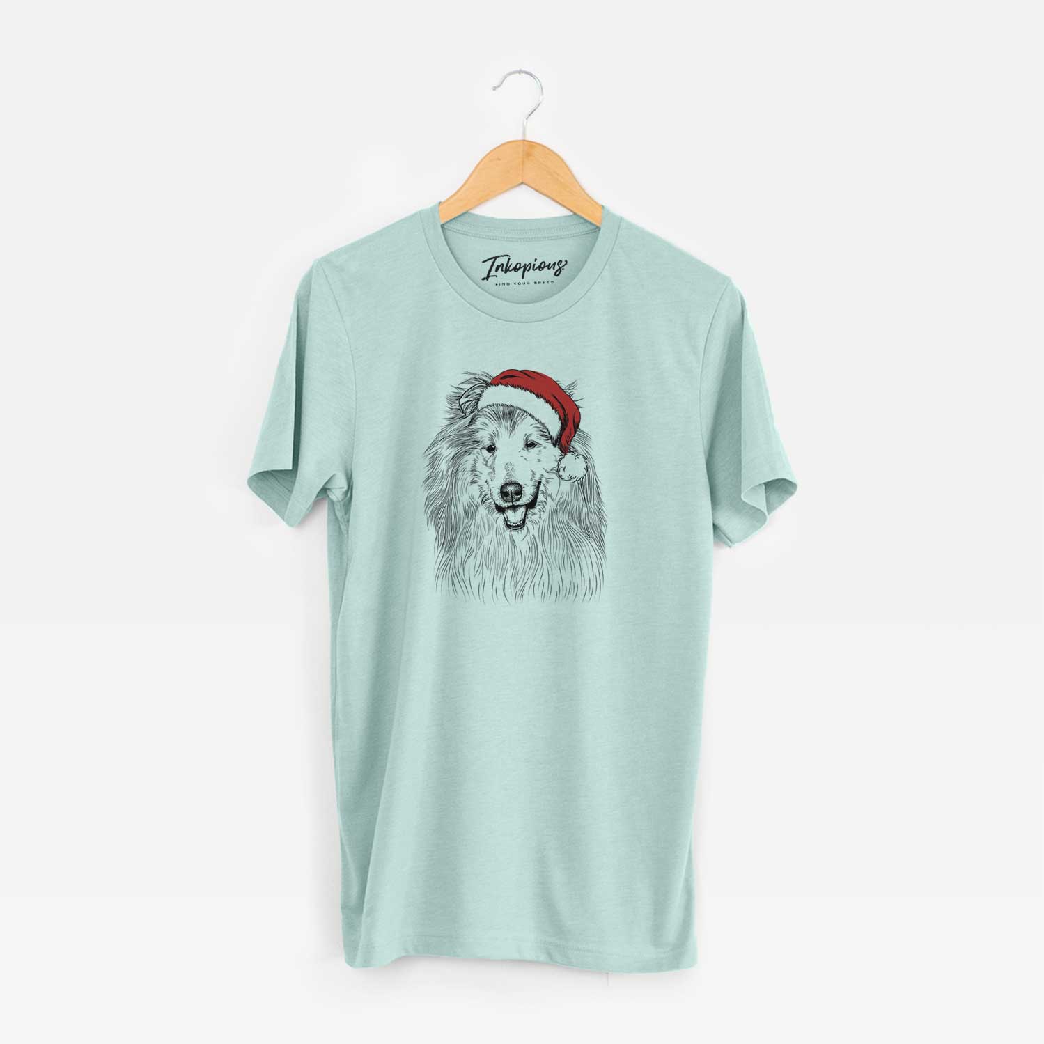 Hand-drawn sketch of Donnan the Rough Collie wearing a Santa hat on a Heather Sage Unisex crewneck