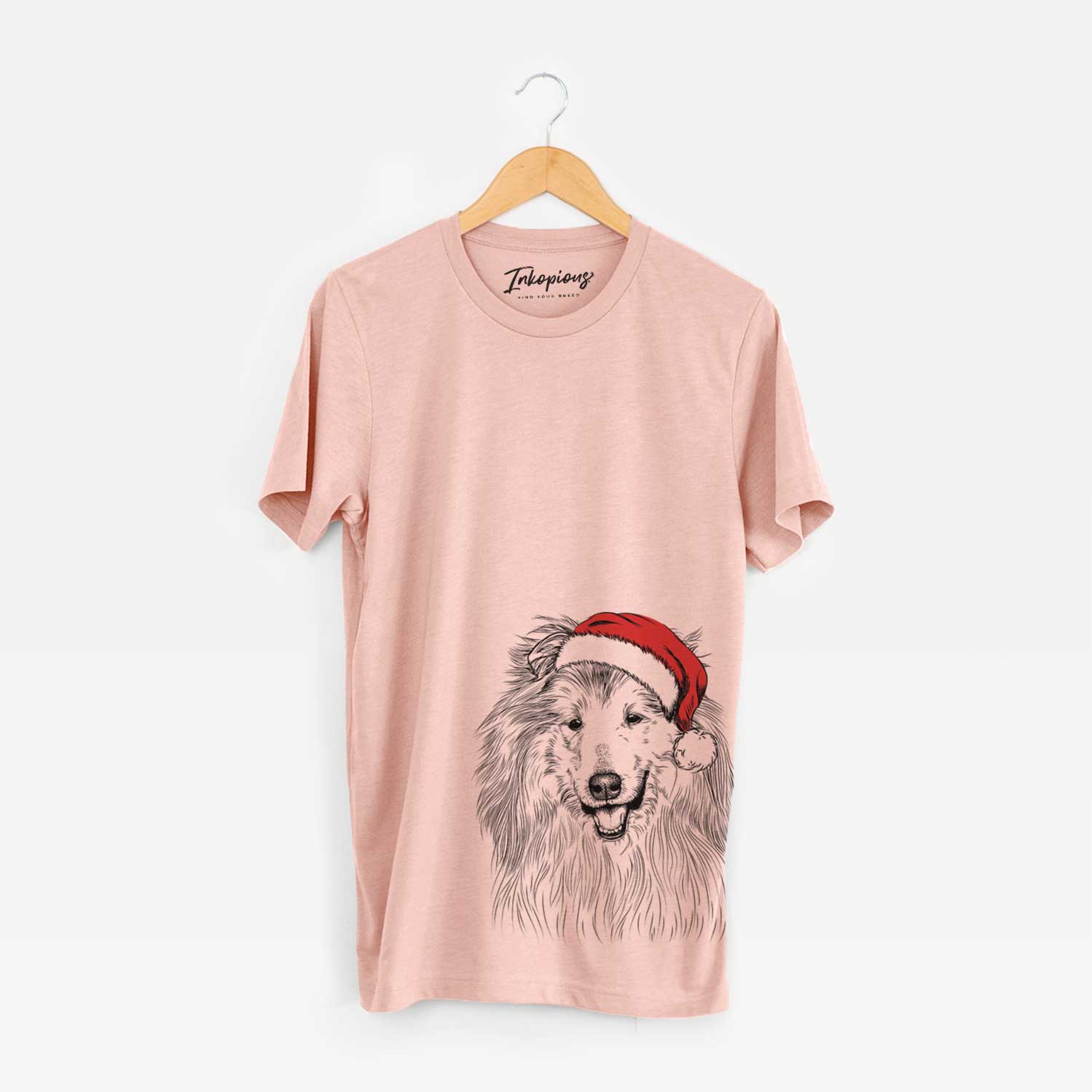 Hand-drawn sketch of Donnan the Rough Collie wearing a Santa hat on a Peach Unisex crewneck
