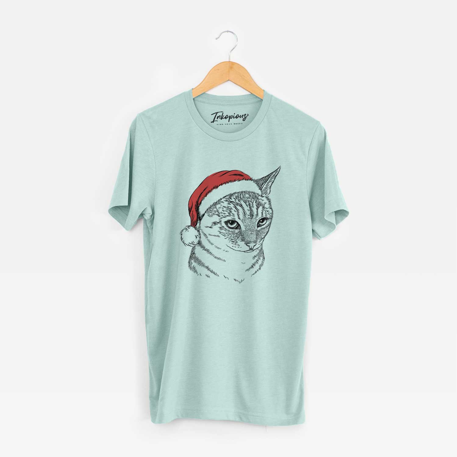 Hand-drawn sketch of Dora the Tabby Cat wearing a Santa hat on a Heather Sage Unisex crewneck