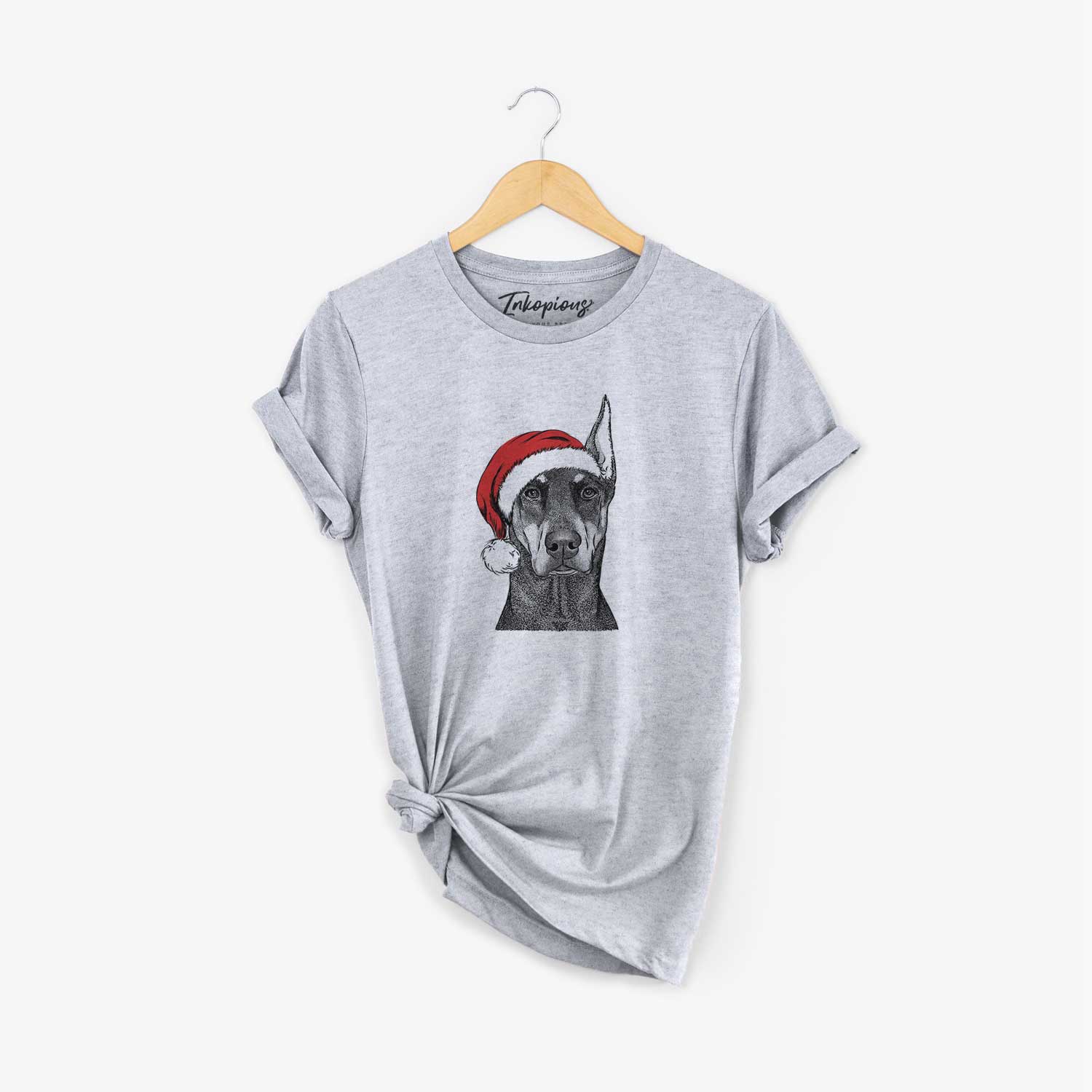 Hand-drawn sketch of Drake the Doberman Pinscher wearing a Santa hat on a Grey Unisex crewneck