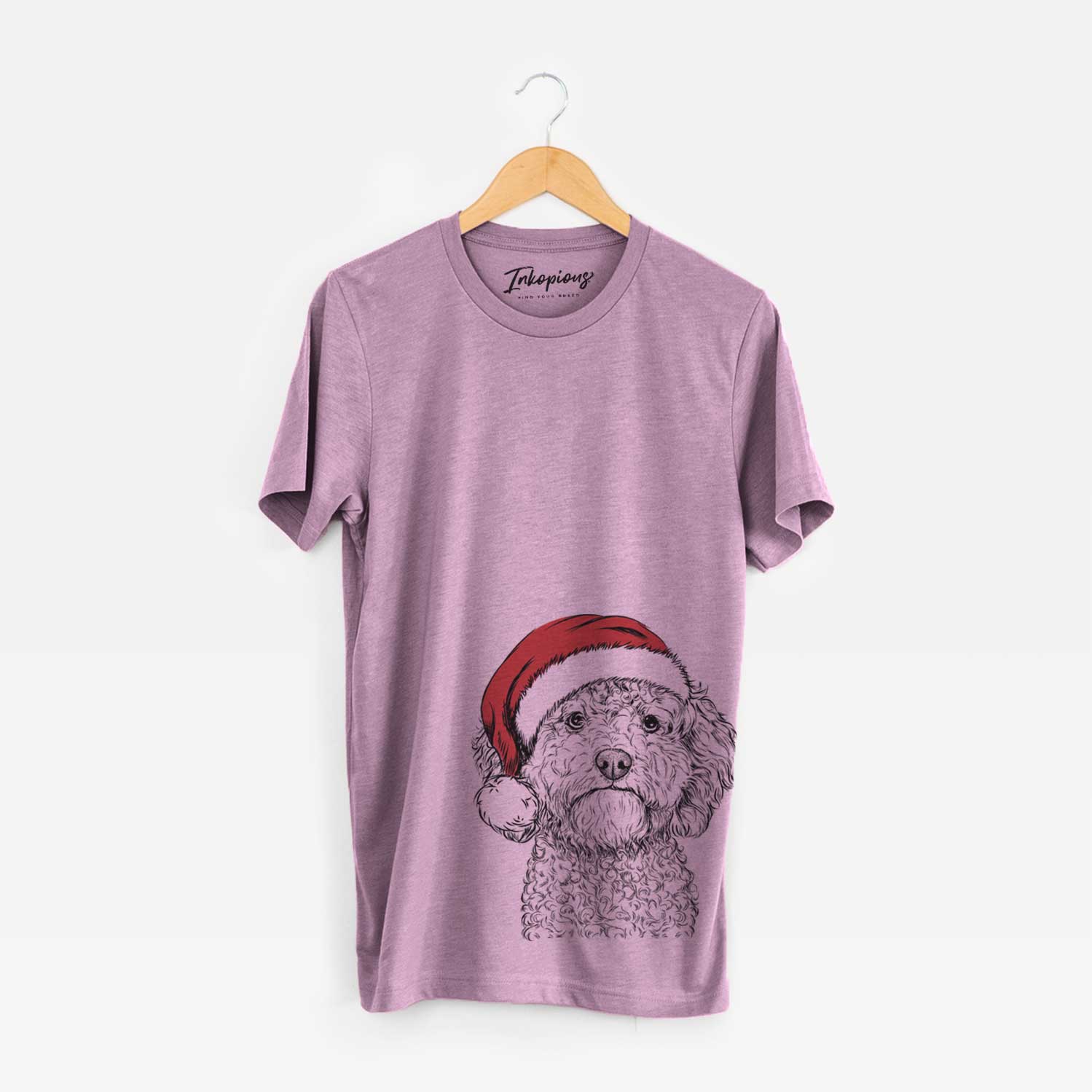 Hand-drawn sketch of Edgar the Shihpoo wearing a Santa hat on an Orchid Unisex crewneck