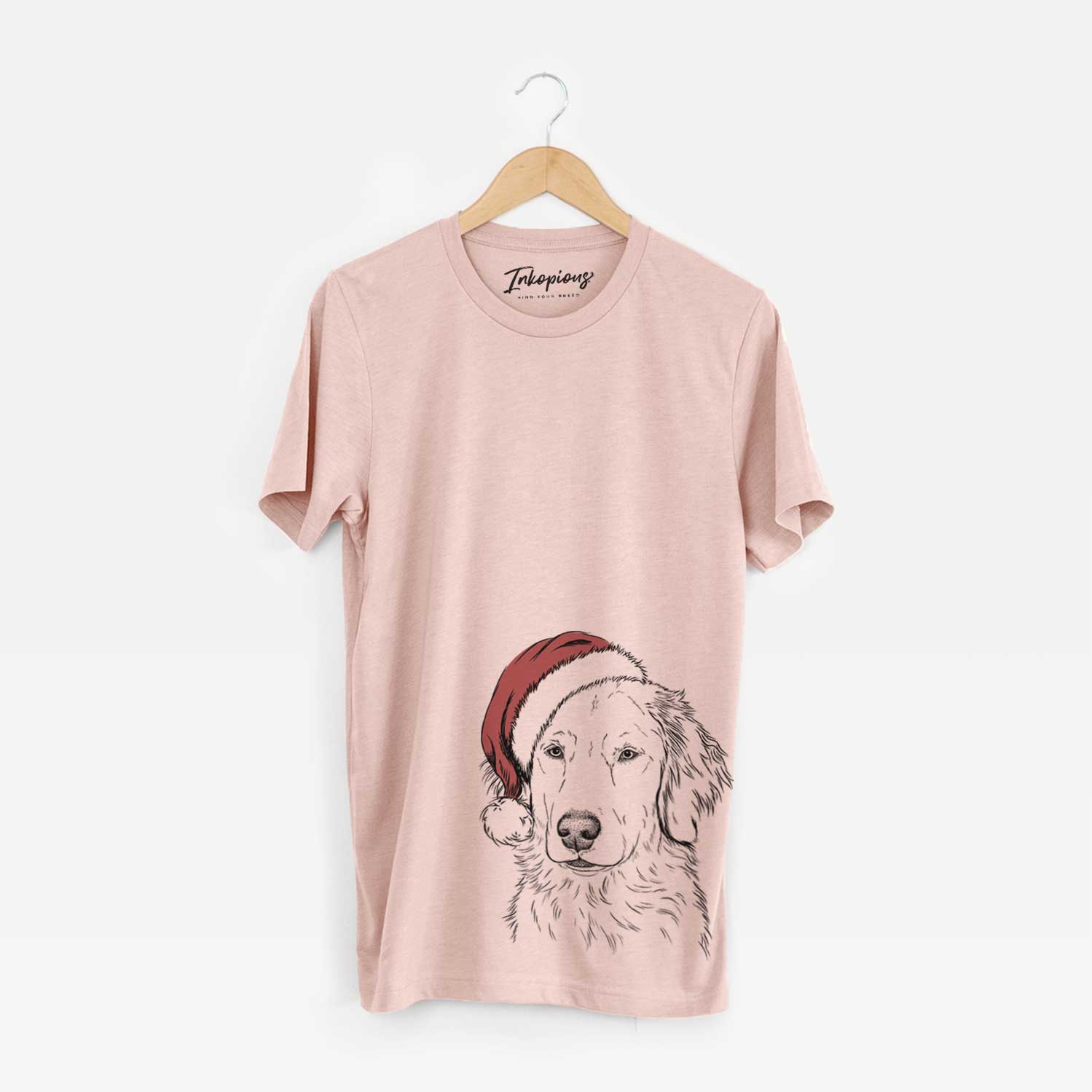 Hand-drawn sketch of Eli the Golden Retriever wearing a Santa hat on a Peach Unisex crewneck