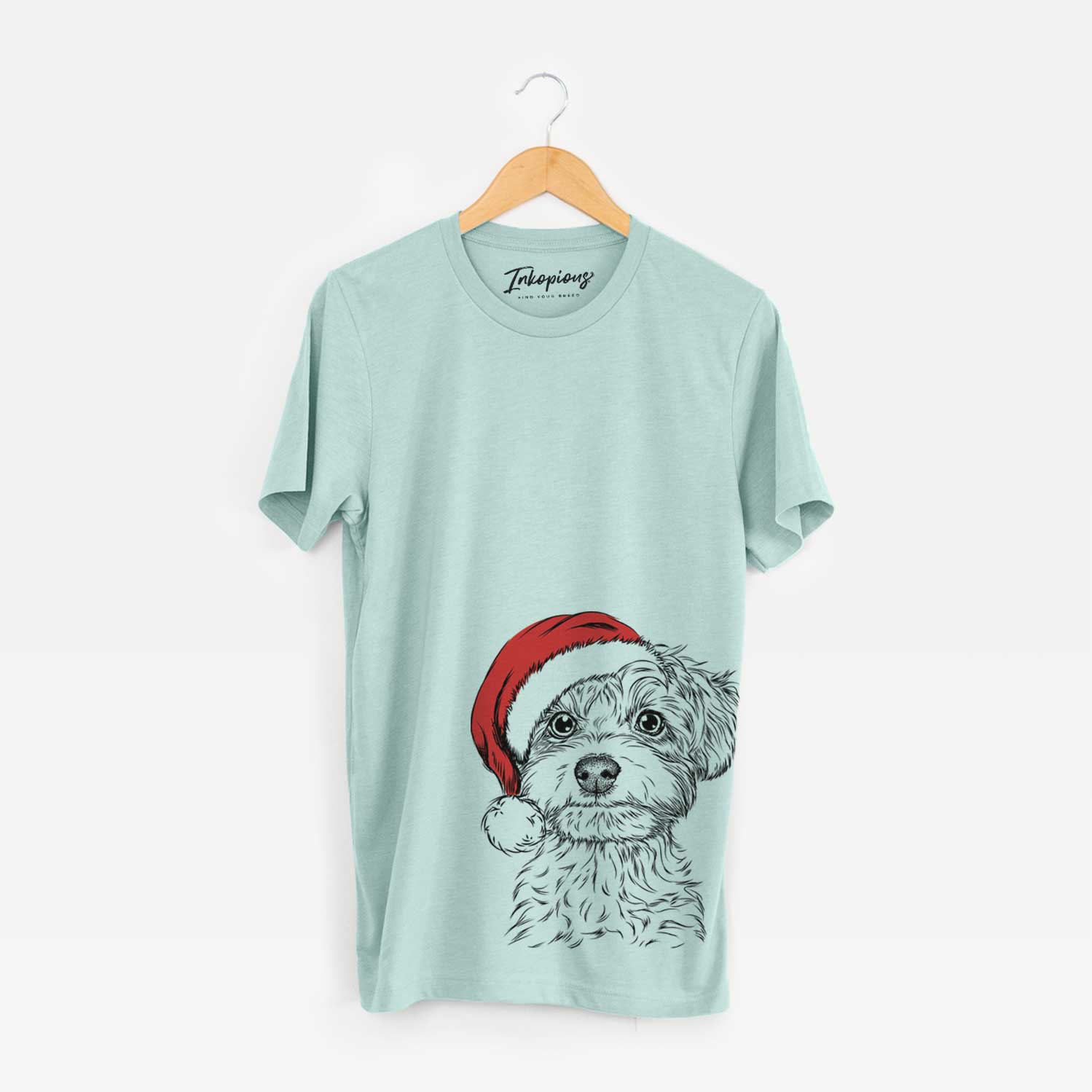 Hand-drawn sketch of Elliott the Yorkiepoo wearing a Santa hat on a Heather Sage Unisex crewneck
