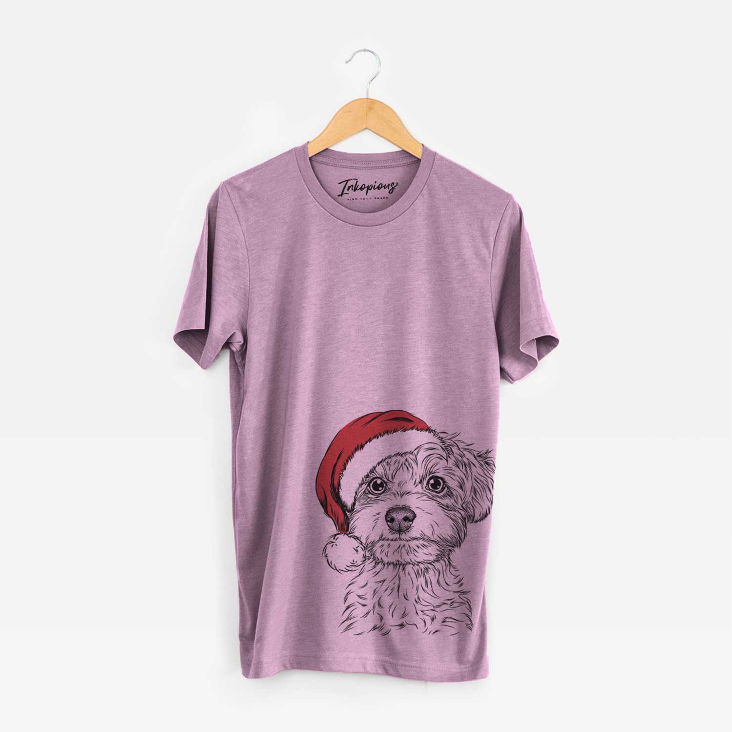 Hand-drawn sketch of Elliott the Yorkiepoo wearing a Santa hat on an Orchid Unisex crewneck