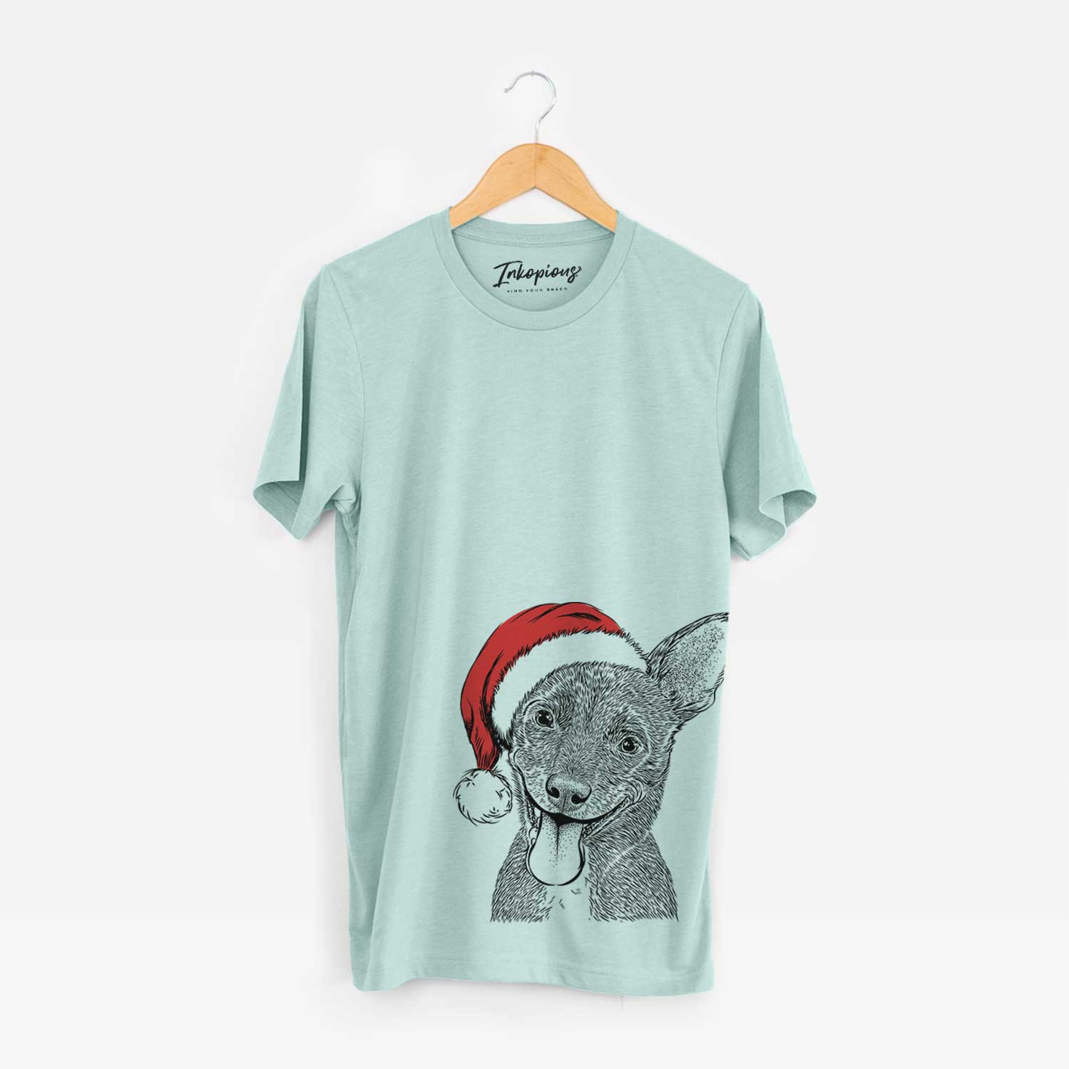 Hand-drawn sketch of Elvira the Terrier Mix wearing a Santa hat on a Heather Sage Unisex crewneck