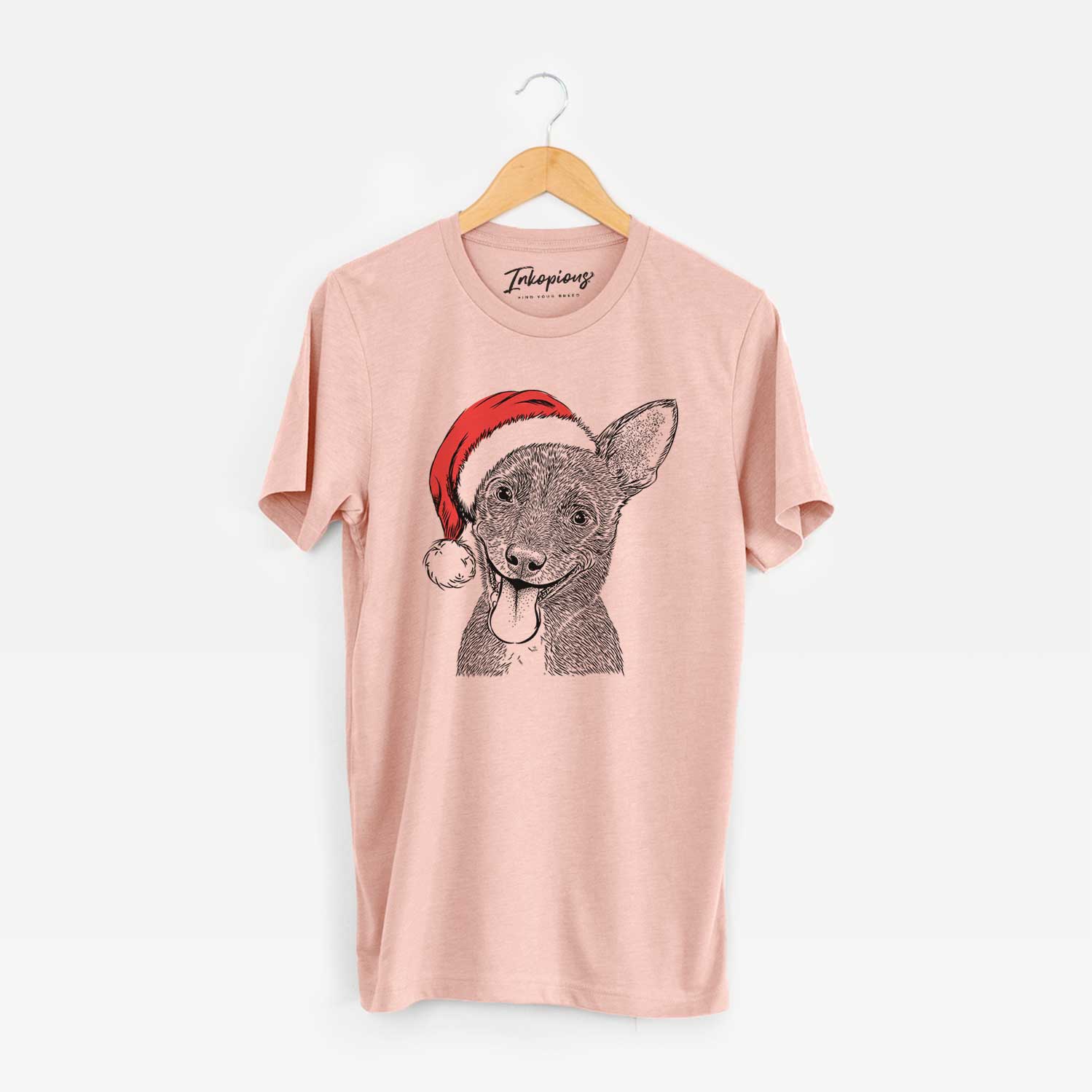 Hand-drawn sketch of Elvira the Terrier Mix wearing a Santa hat on a Peach Unisex crewneck
