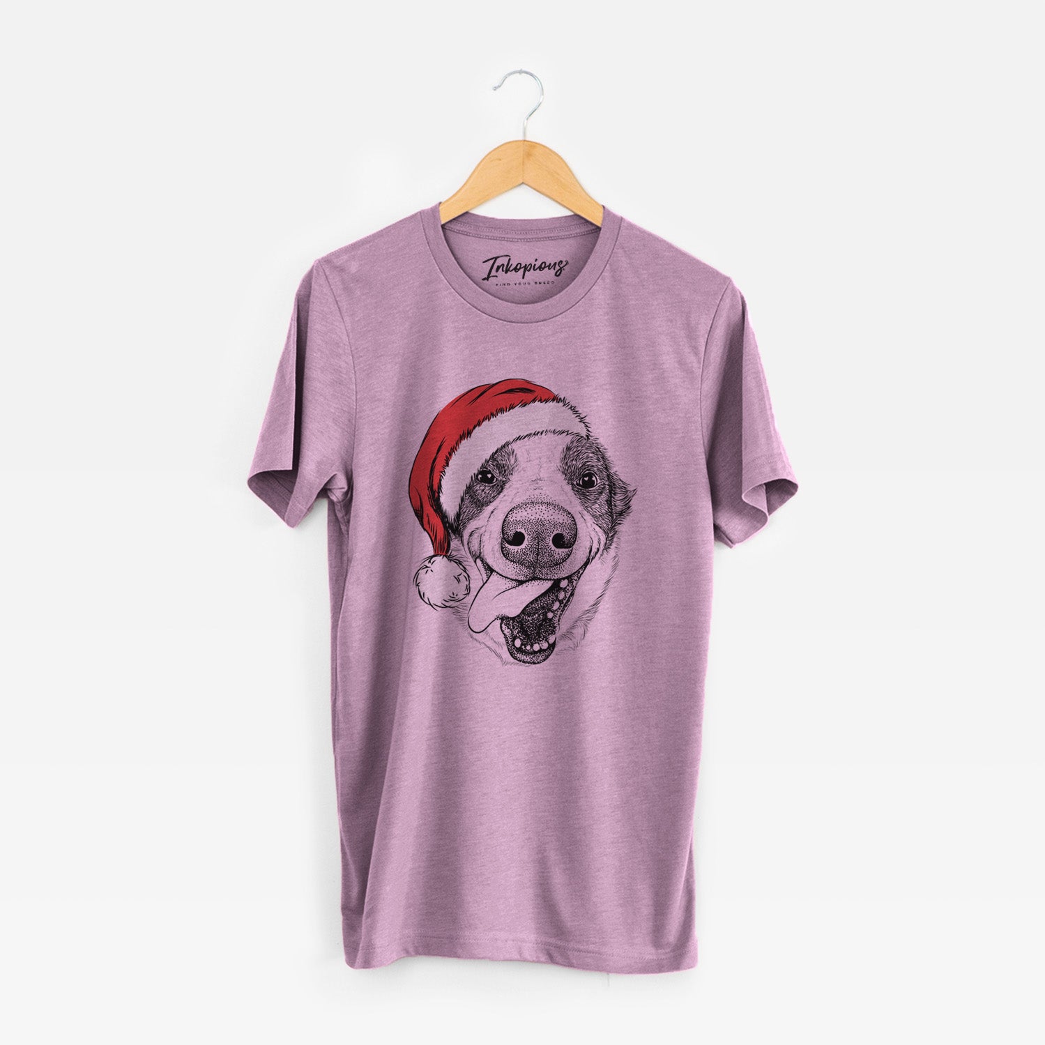 Hand-drawn sketch of Elwood the Border Collie wearing a Santa hat on an Orchid Unisex crewneck
