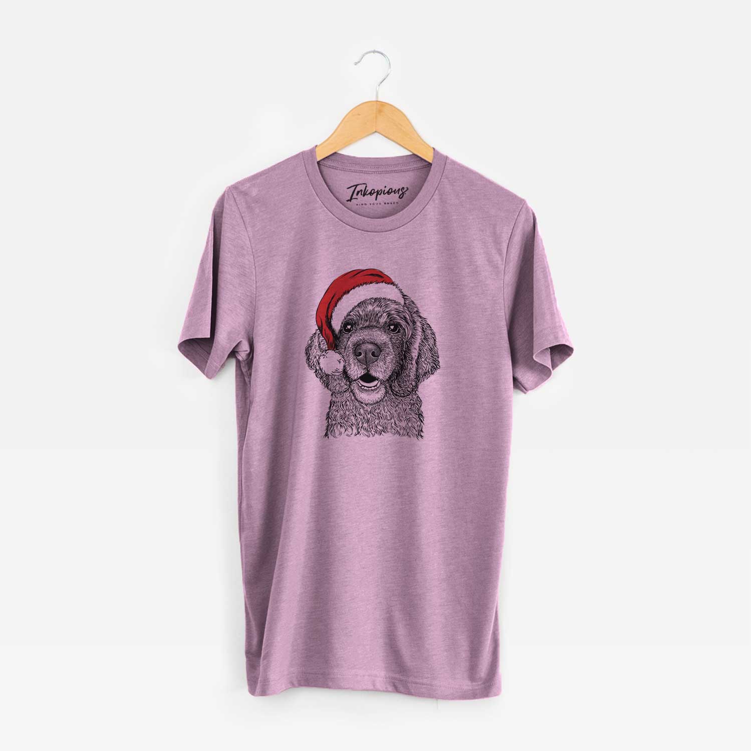 Hand-drawn sketch of Fannie Mae the Cocker Spaniel wearing a Santa hat on an Orchid Unisex crewneck