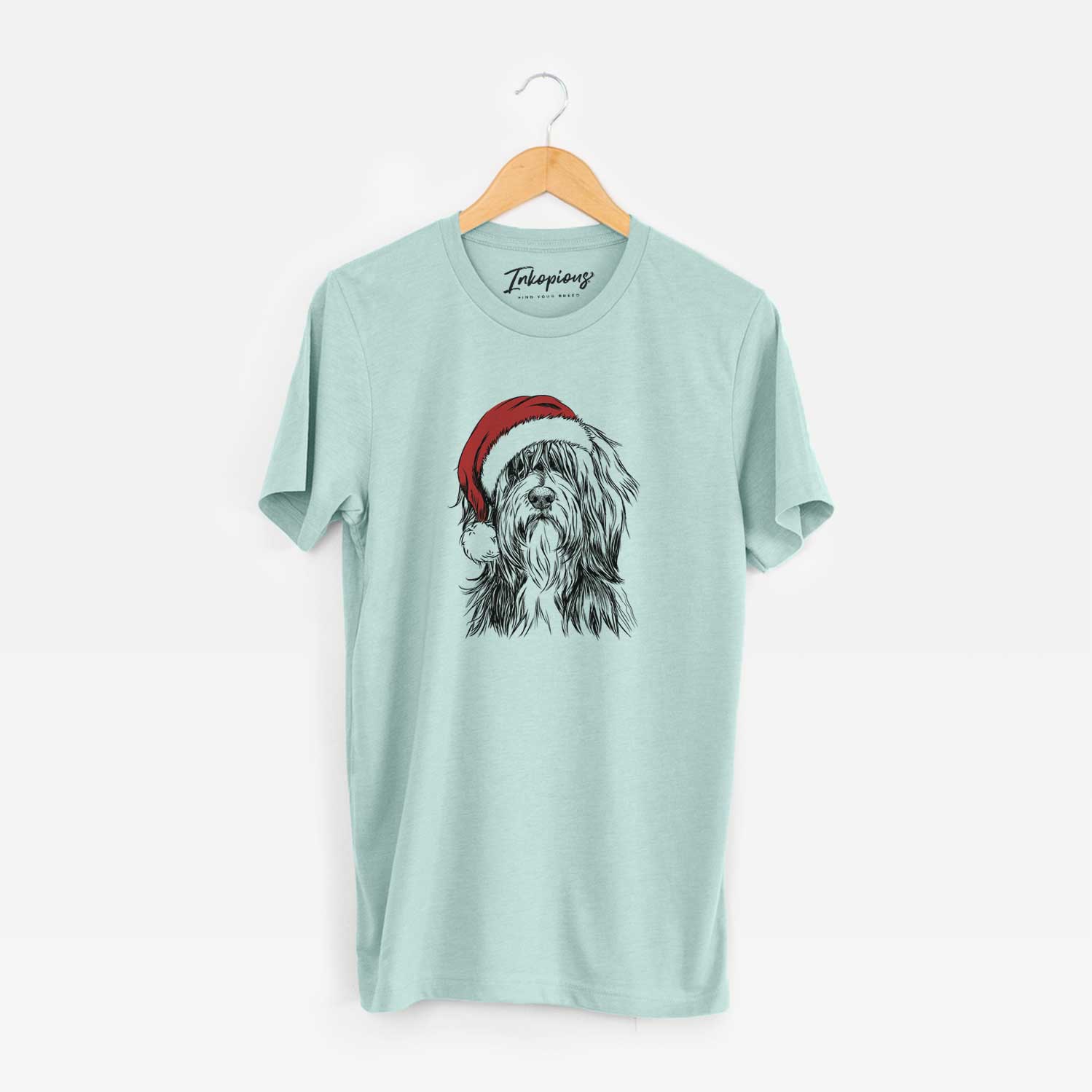 Hand-drawn sketch of Fiji the Polish Lowland Sheepdog wearing a Santa hat on a Heather Sage Unisex crewneck