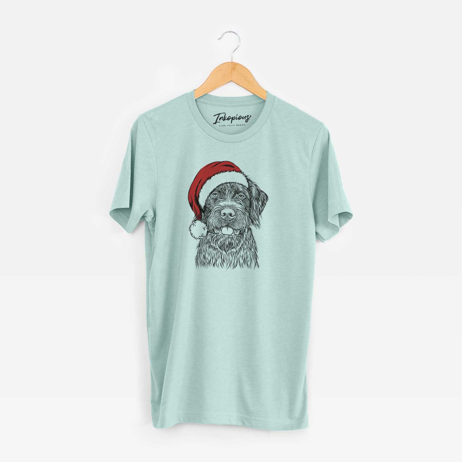 Hand-drawn sketch of Fletcher the Wirehaired Pointing Griffon wearing a Santa hat on a Heather Sage Unisex crewneck