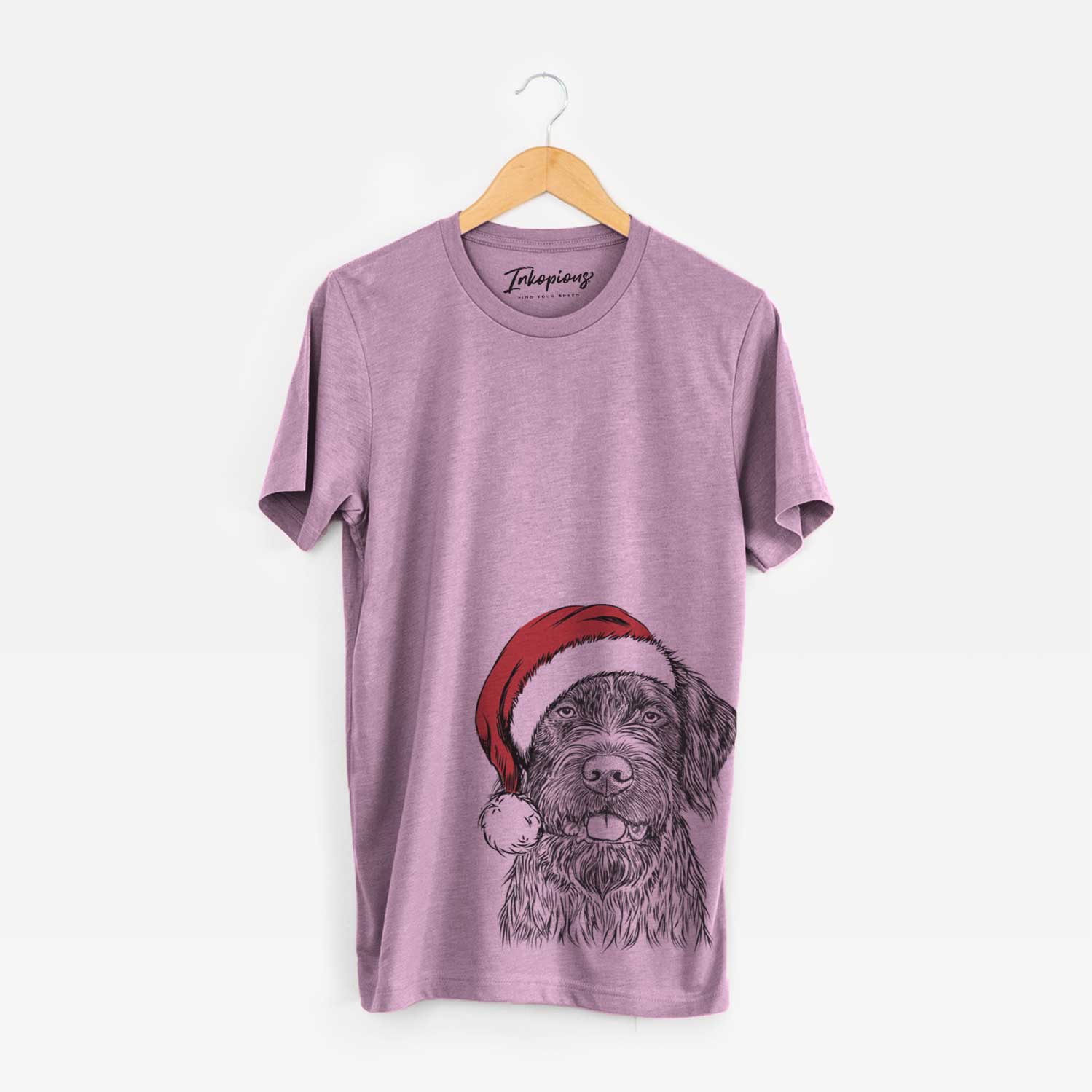 Hand-drawn sketch of Fletcher the Wirehaired Pointing Griffon wearing a Santa hat on an Orchid Unisex crewneck