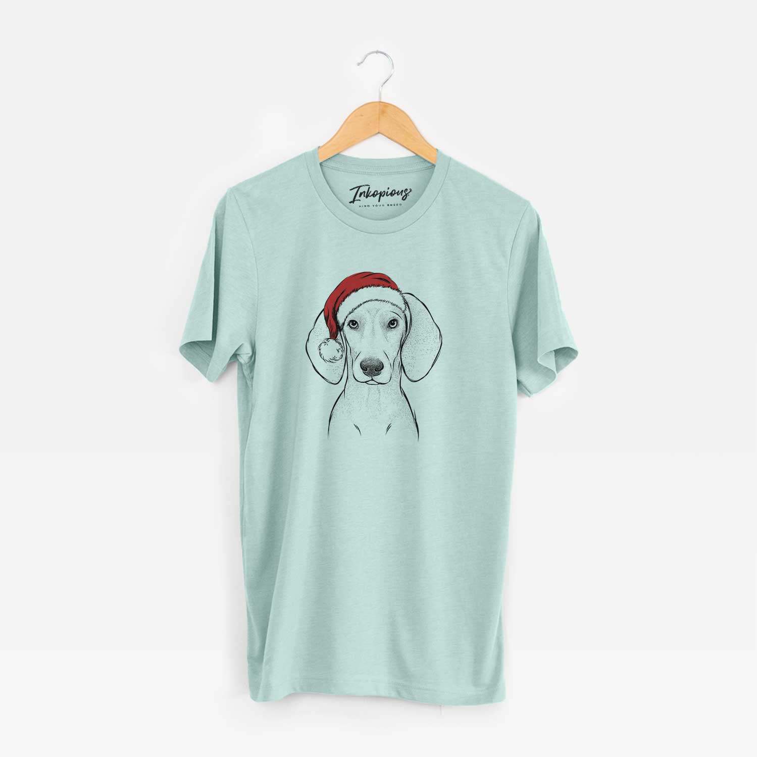 Hand-drawn sketch of Frejya the Weimaraner wearing a Santa hat on a Heather Sage Unisex crewneck