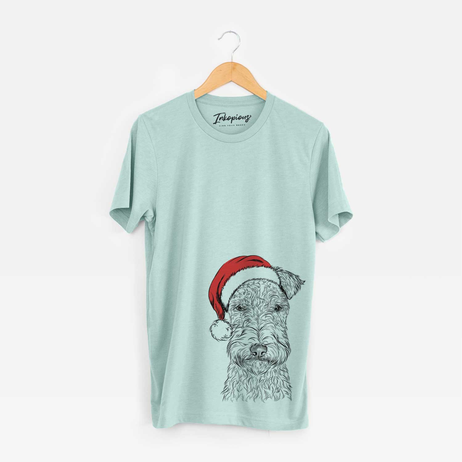Hand-drawn sketch of Frida the Lakeland Terrier wearing a Santa hat on a Heather Sage Unisex crewneck