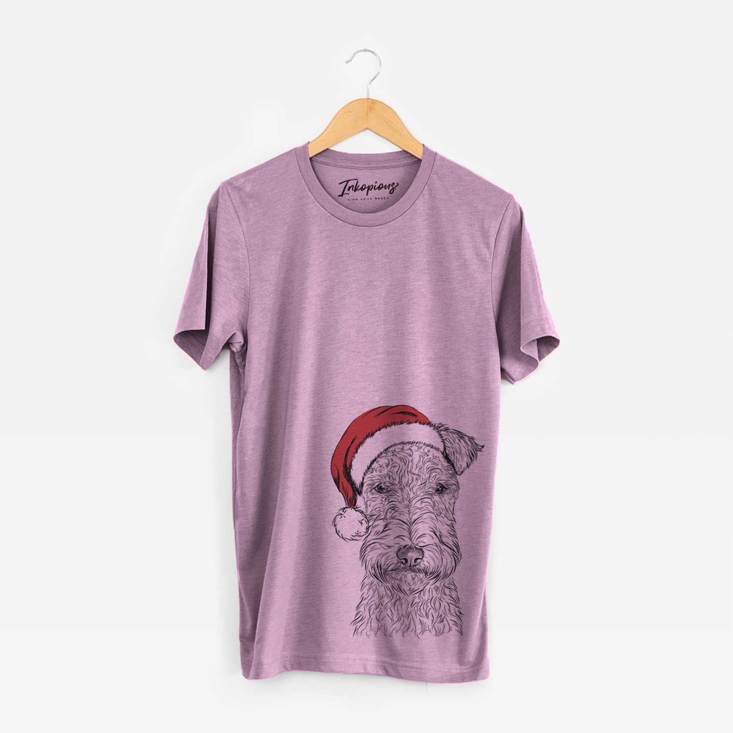 Hand-drawn sketch of Frida the Lakeland Terrier wearing a Santa hat on an Orchid Unisex crewneck