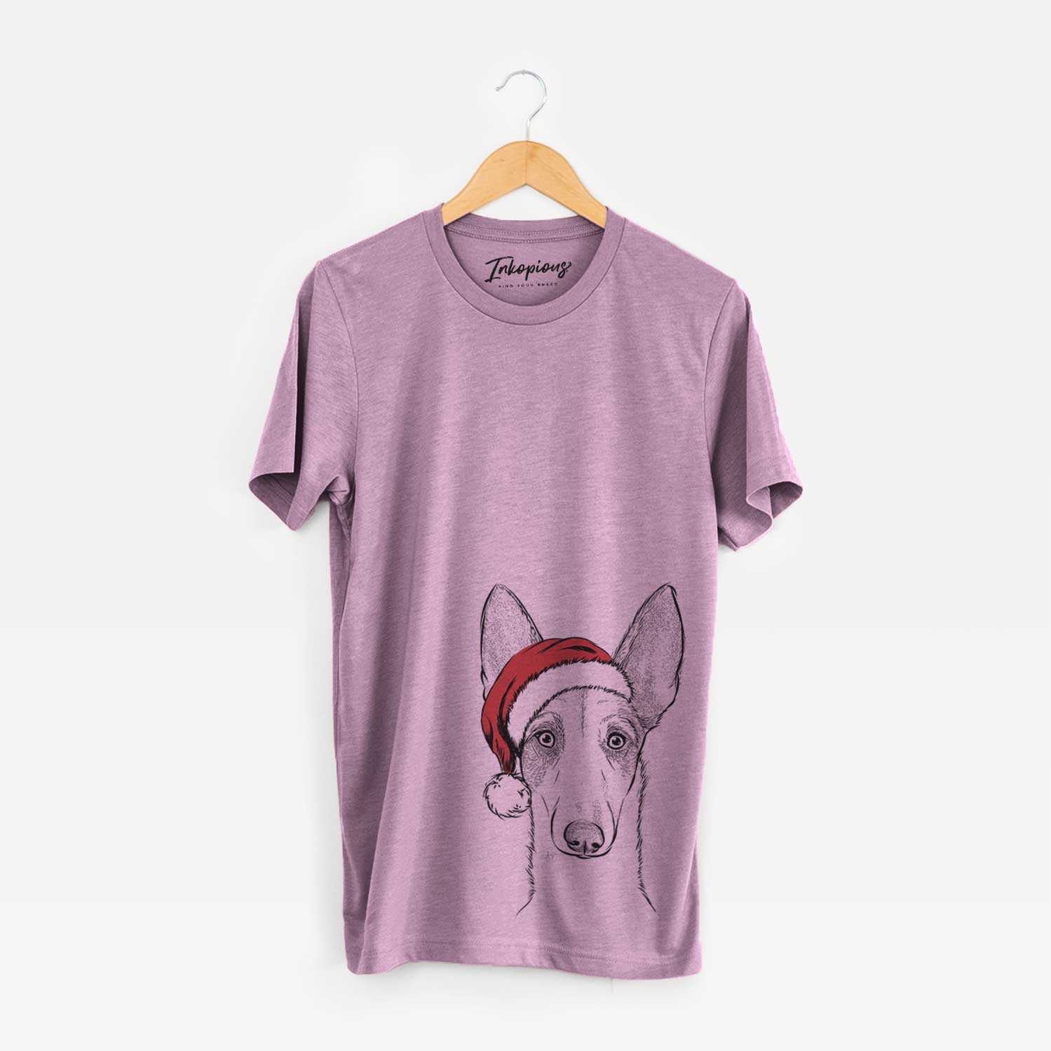 Hand-drawn sketch of Halo the Ibizan Sight Hound wearing a Santa hat on an Orchid Unisex crewneck