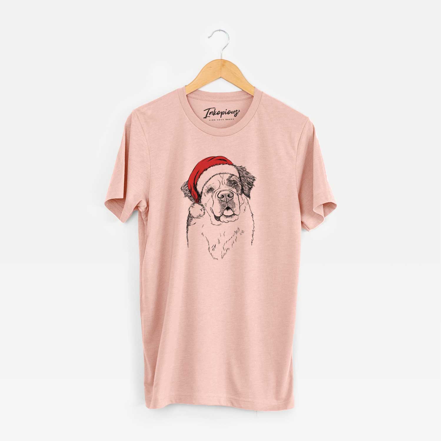 Hand-drawn sketch of Hook the Saint Bernard wearing a Santa hat on a Peach Unisex crewneck