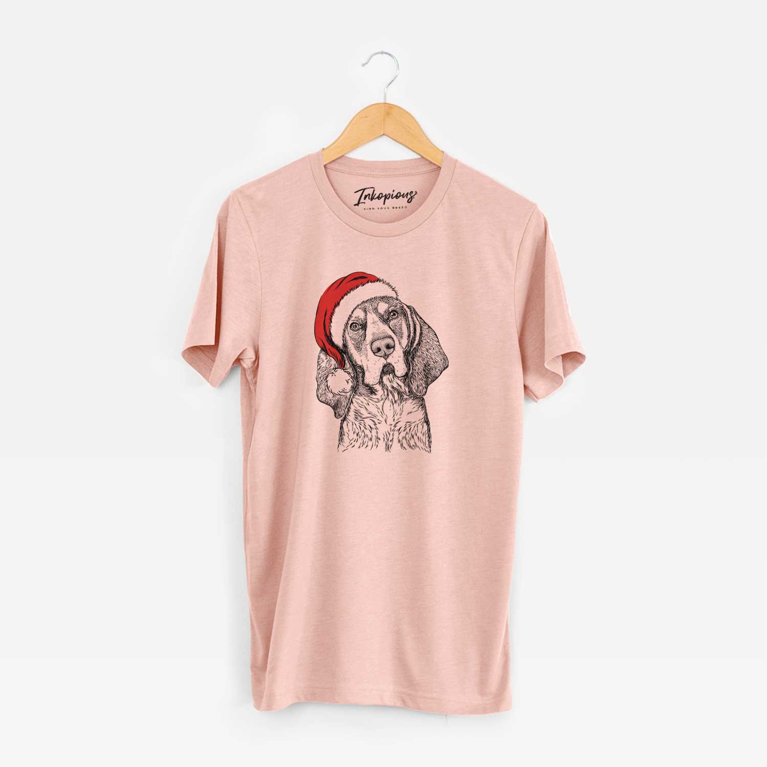Hand-drawn sketch of Huck the Bluetick Coonhound wearing a Santa hat on a Peach Unisex crewneck