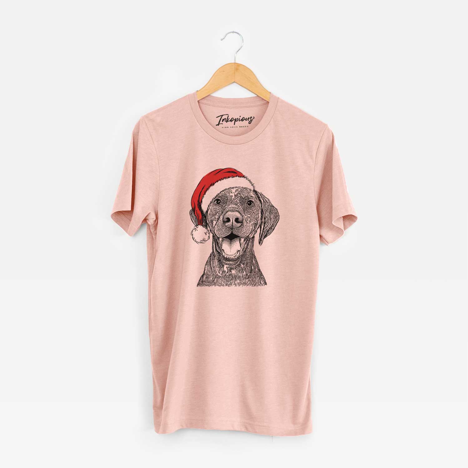 Hand-drawn sketch of Hudson the German Shorthaired Pointer wearing a Santa hat on a Peach Unisex crewneck