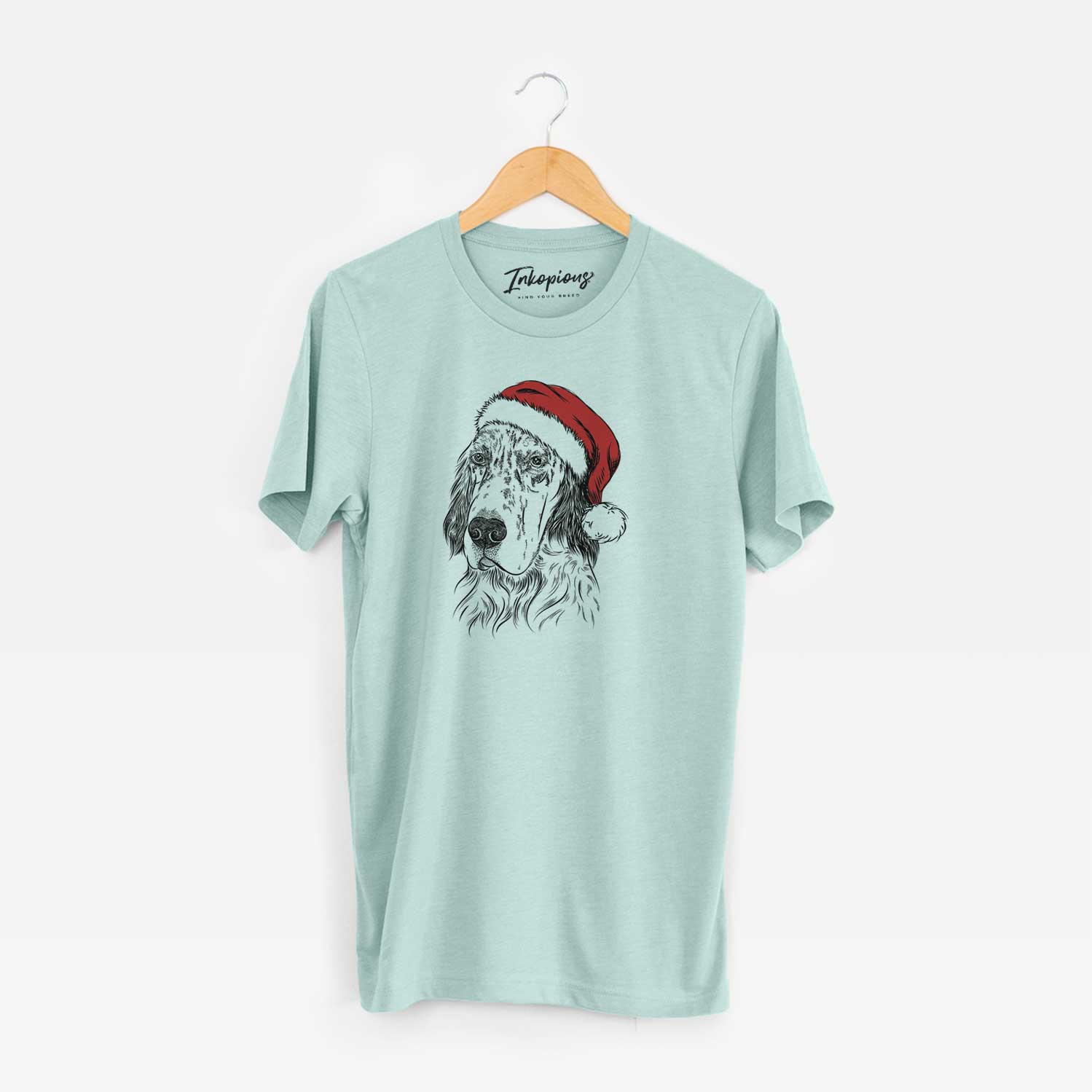 Hand-drawn sketch of Hutch the English Setter wearing a Santa hat on a Heather Sage Unisex crewneck