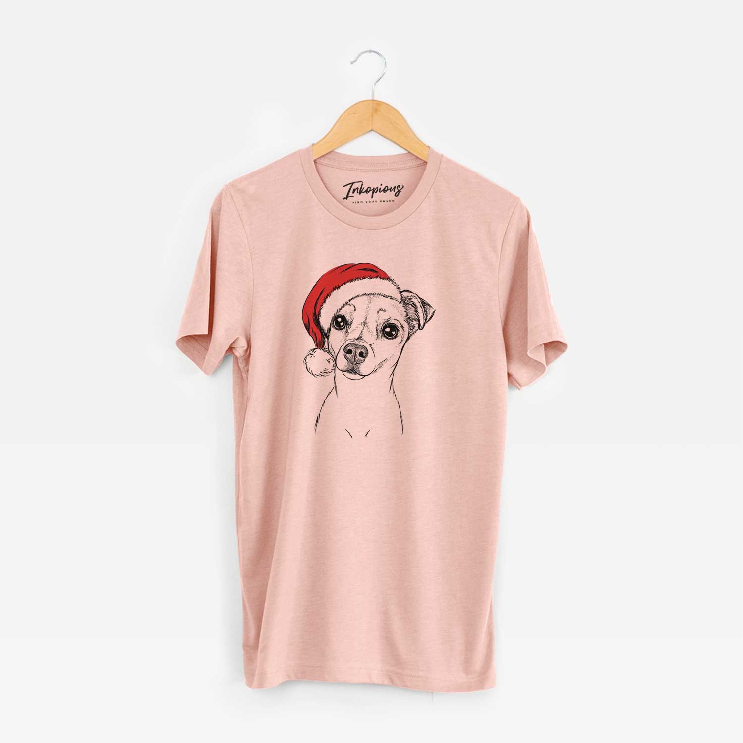 Hand-drawn sketch of Izzy the Chiweenie wearing a Santa hat on a Peach Unisex crewneck