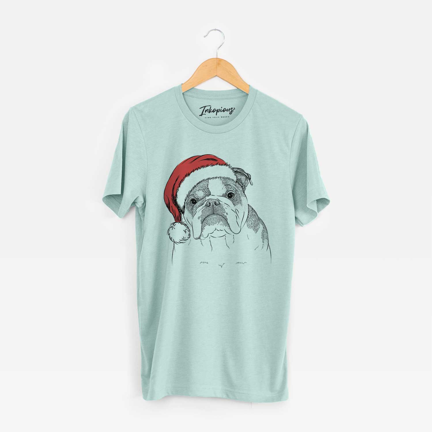 Hand-drawn sketch of Jack the English Bulldog wearing a Santa hat on a Heather Sage Unisex crewneck