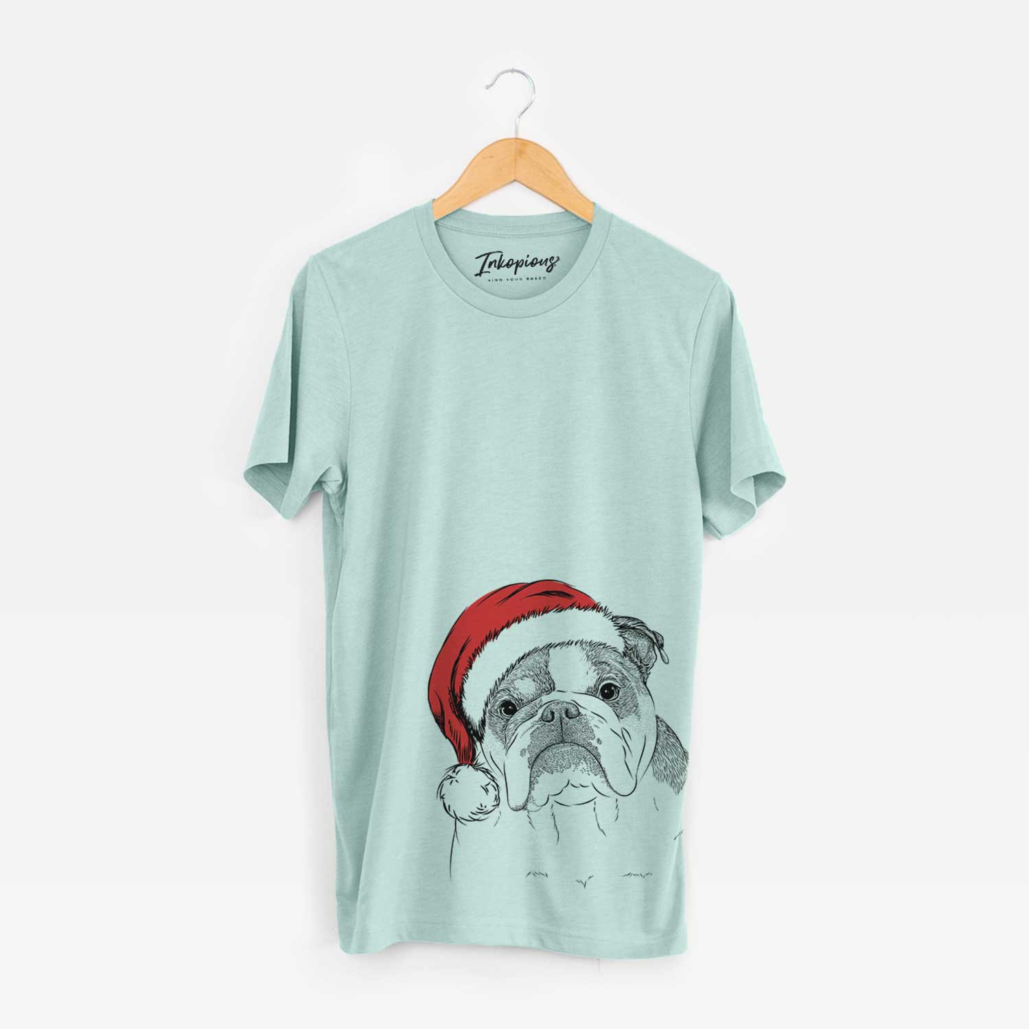 Hand-drawn sketch of Jack the English Bulldog wearing a Santa hat on a Heather Sage Unisex crewneck